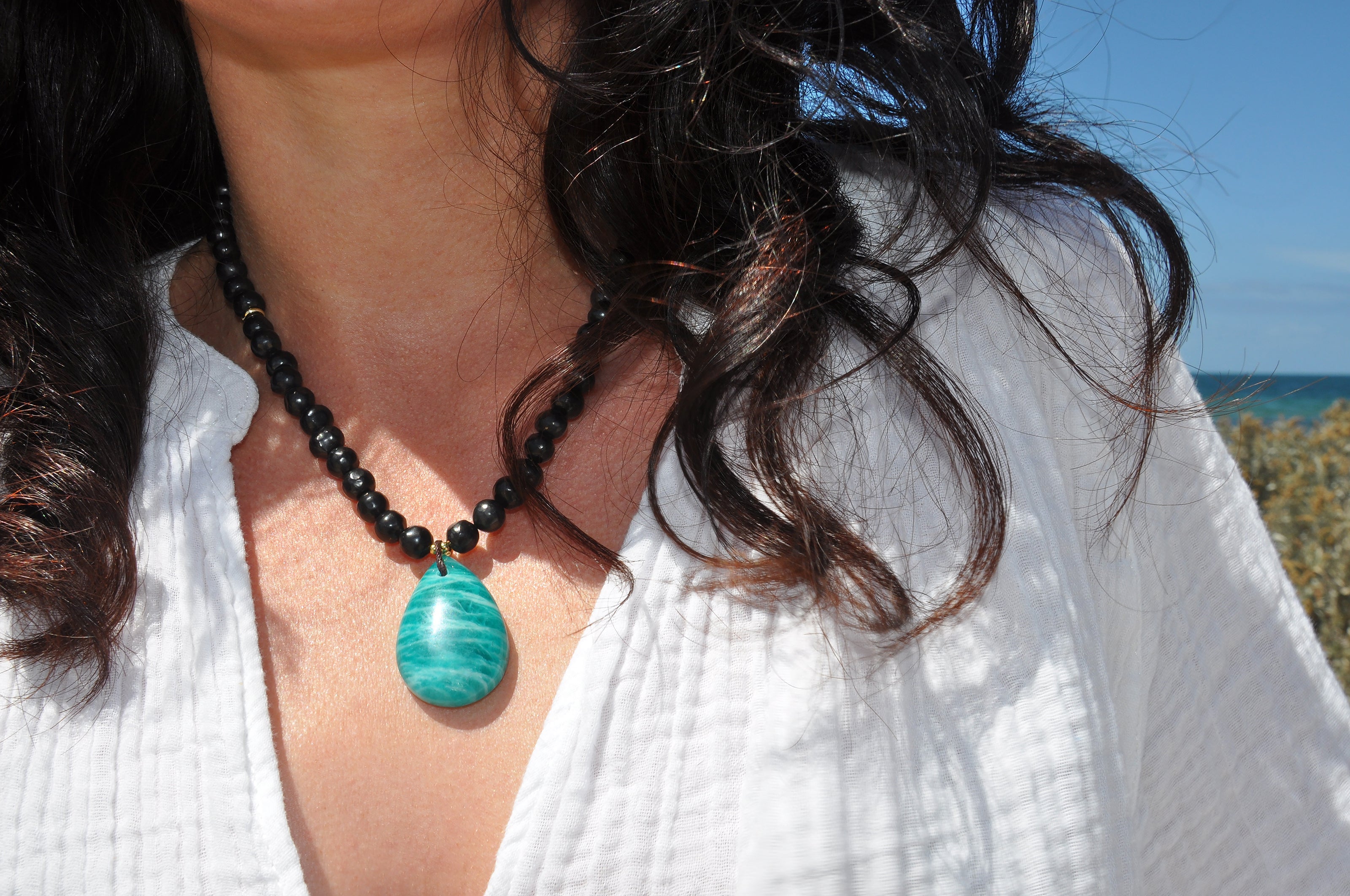 Tunik hand crafted gold fill necklace with semi precious stone natural shungite pebble beads and green amazonite statement pendant, jewellery gift.