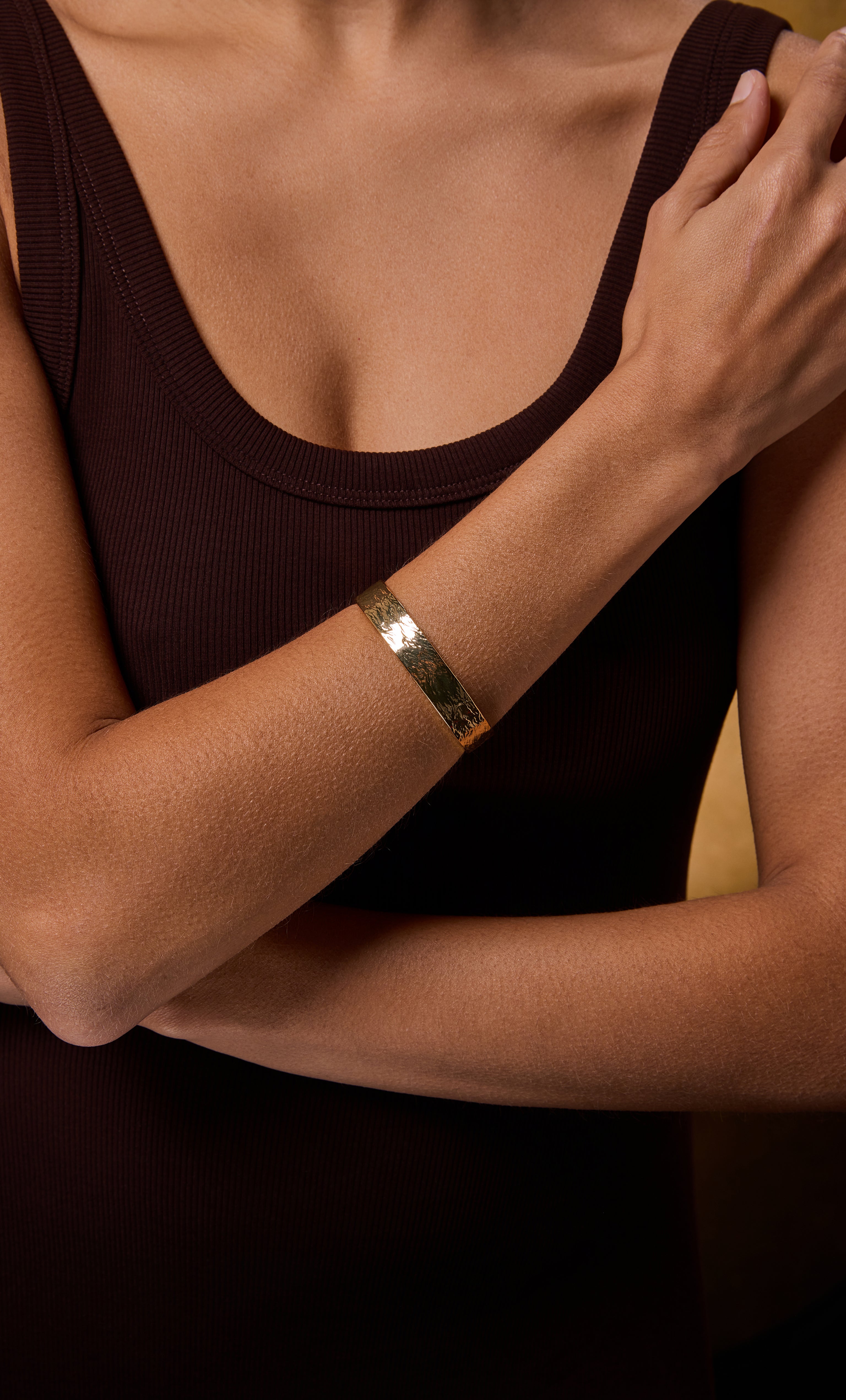 Tunik 18K gold fill hammered cuff bangle bracelet on wrist, elegant jewellery gift idea.