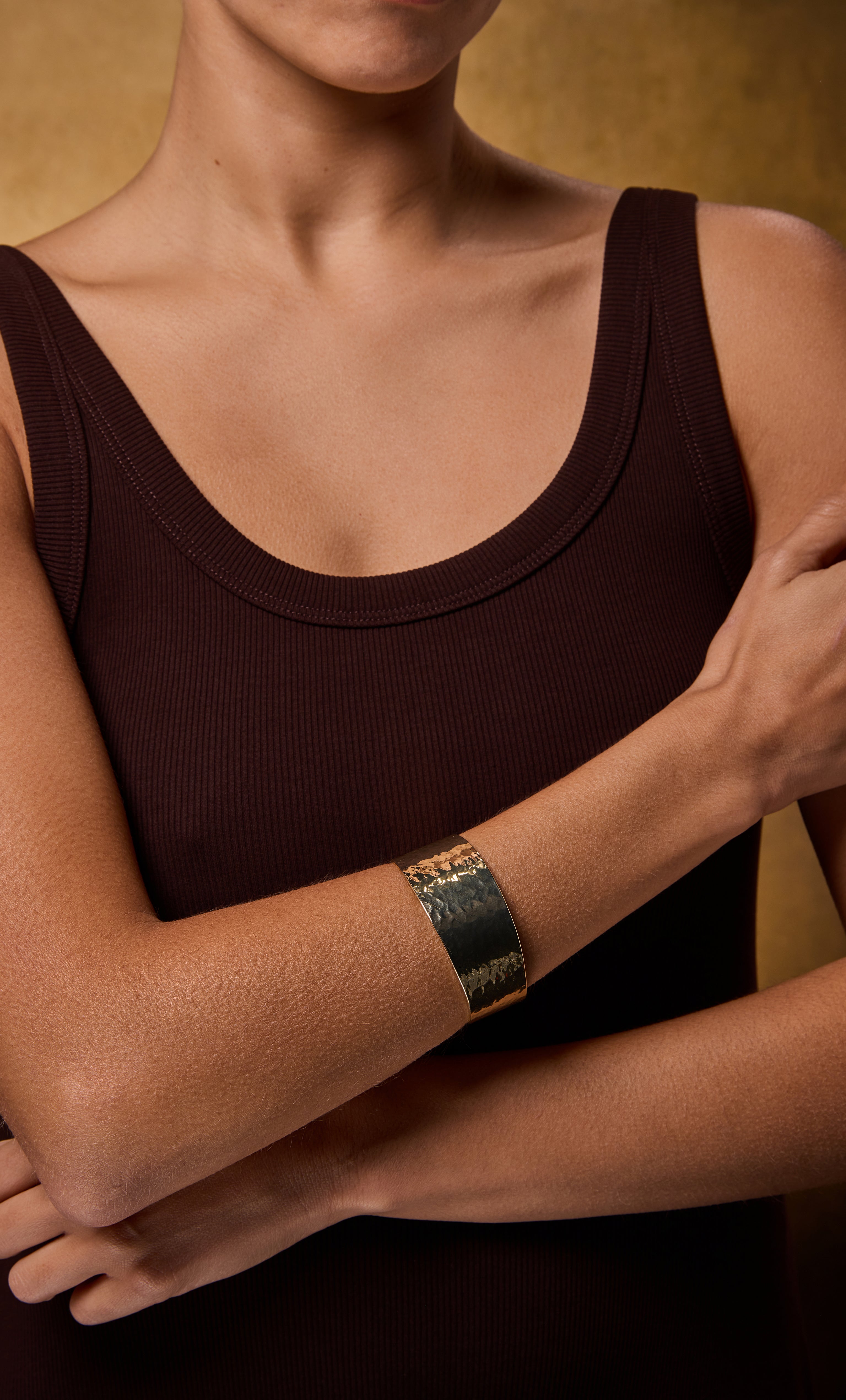 Tunik gold fill hammered cuff bangle bracelet worn with dark tank top, elegant jewellery gift.