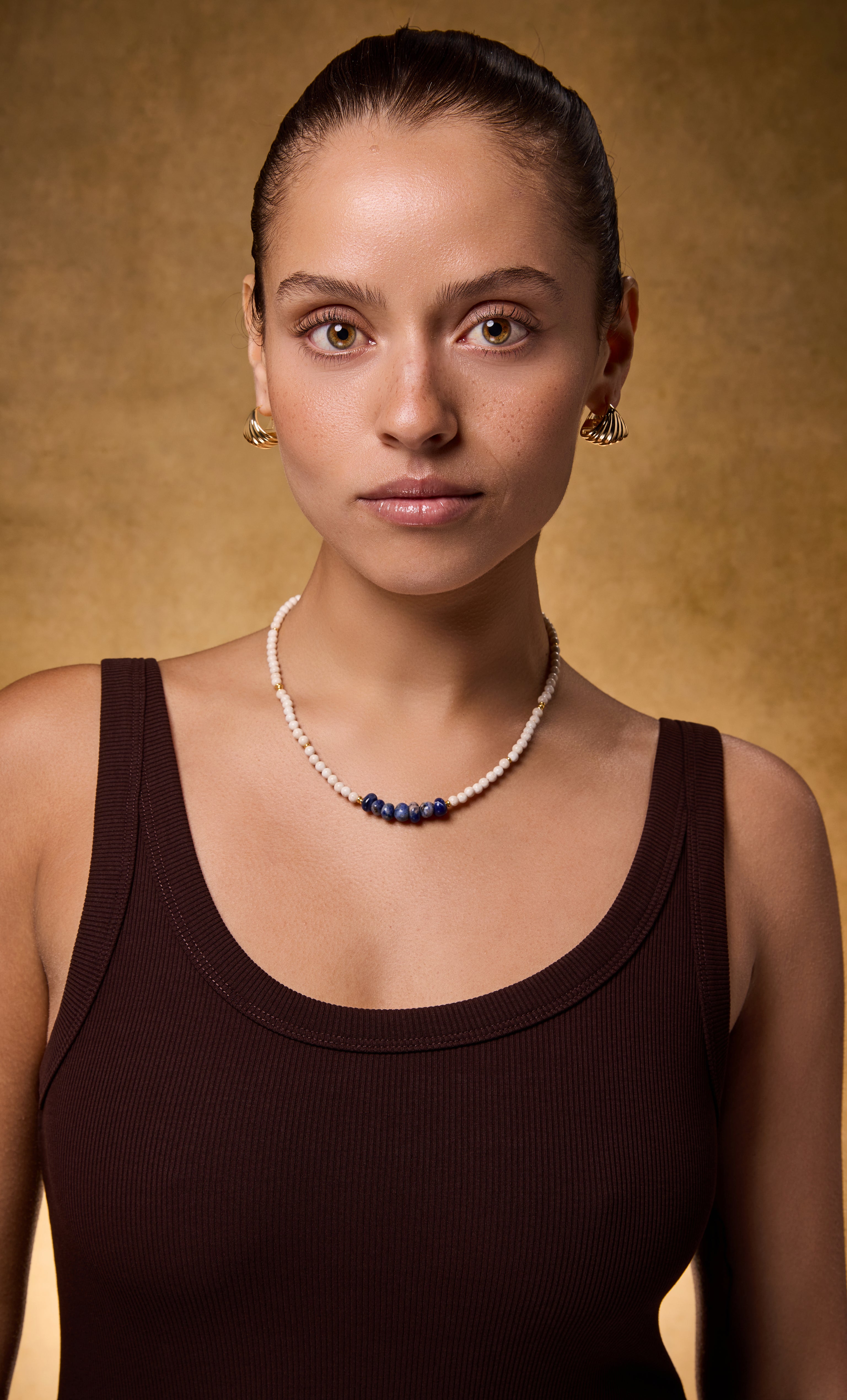 Tunik gold fill necklace with blue sodalite and fossil stone beads, elegant jewellery gift.