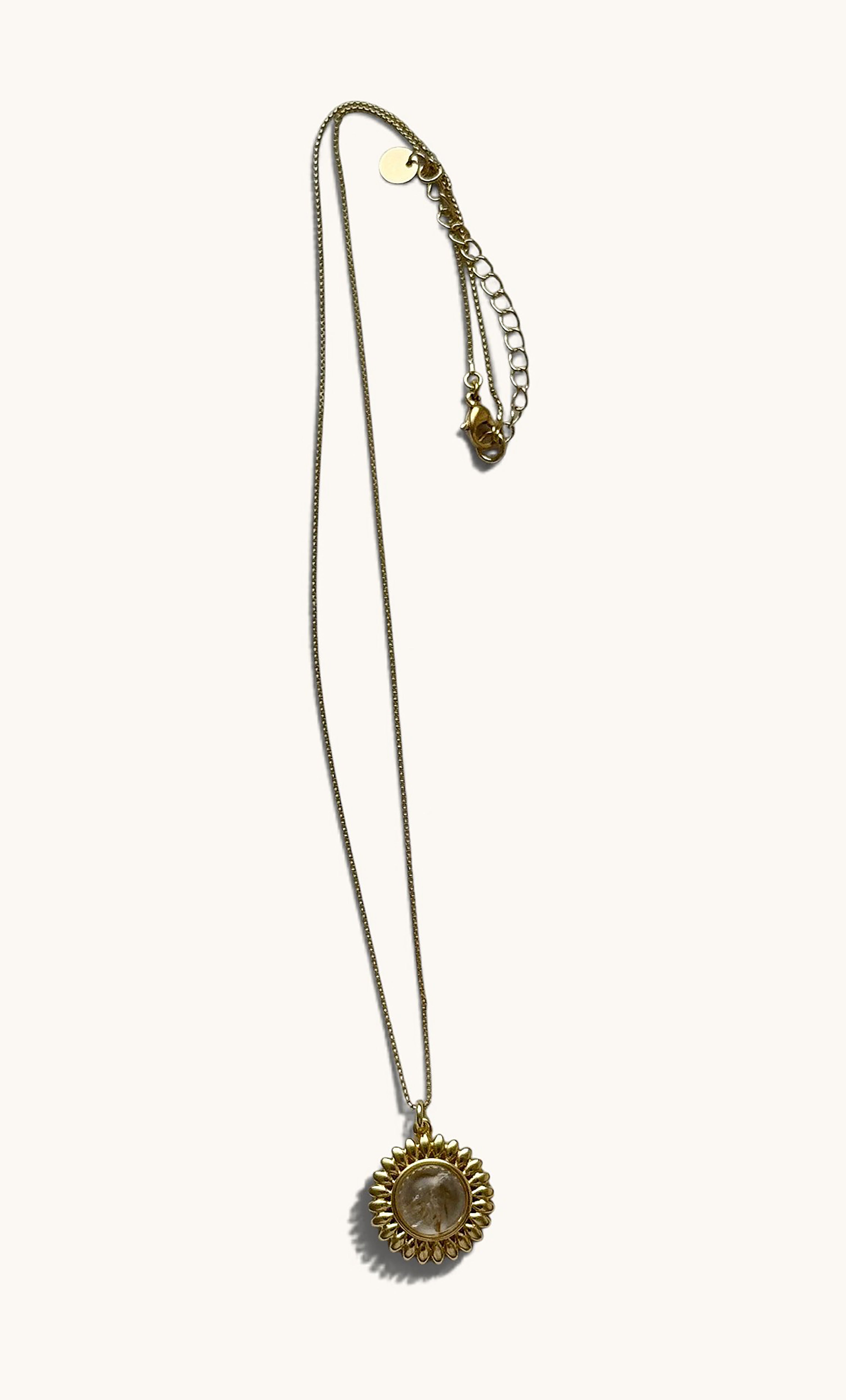14K gold fill sun talisman pendant necklace with moonstone center on delicate chain.