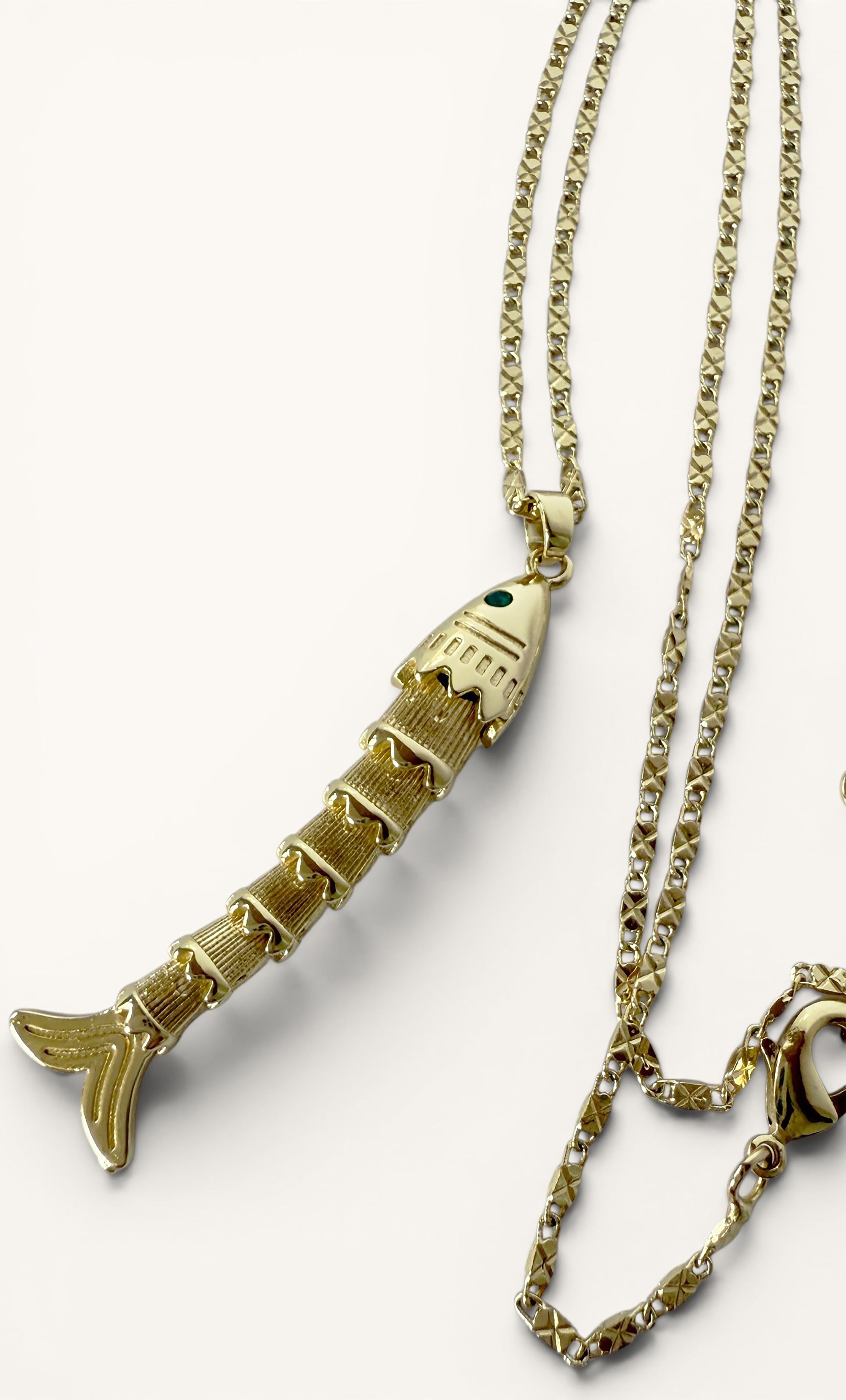 24K gold fill koi fish pendant with textured scales on delicate gold chain necklace.