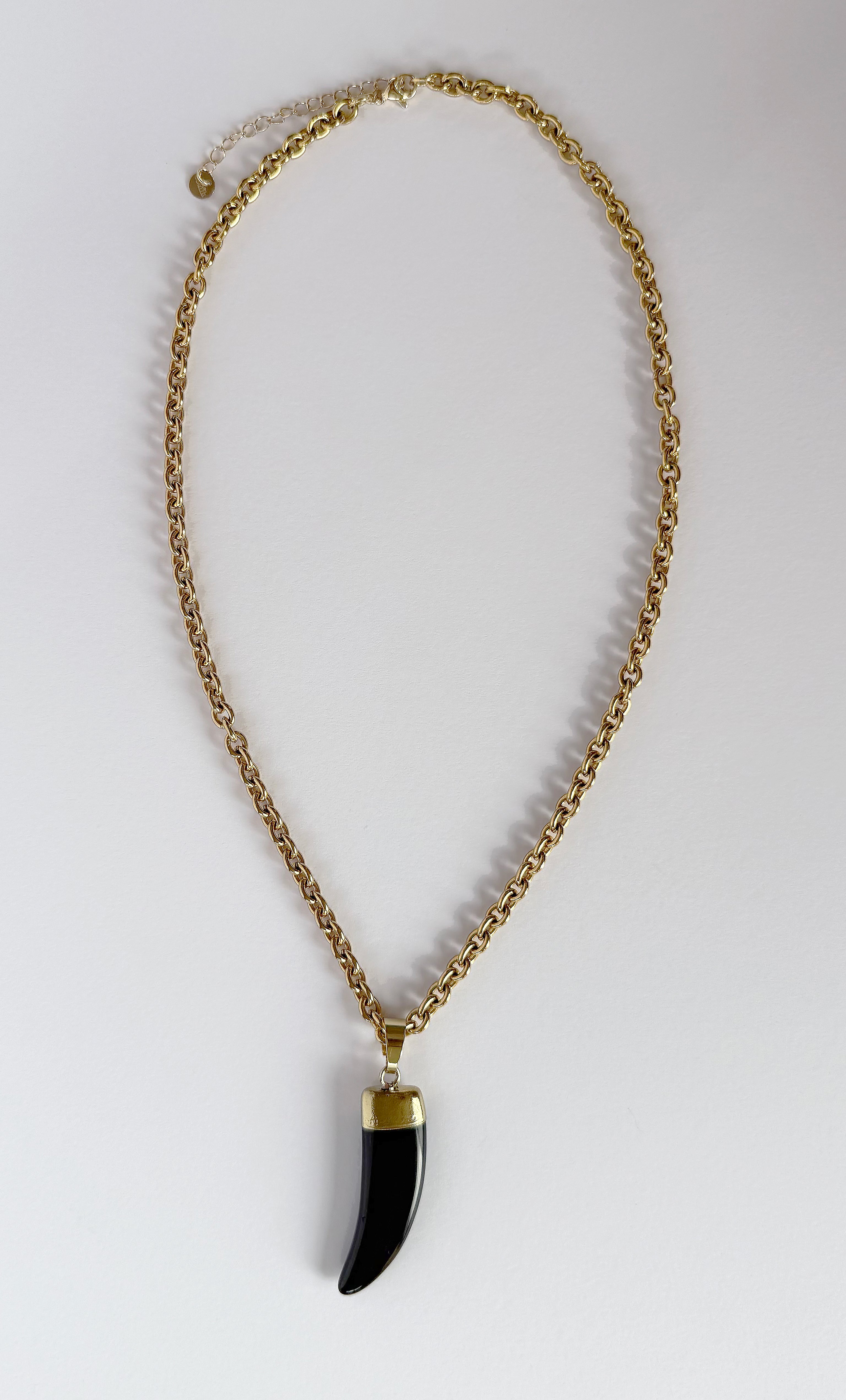 Gold fill necklace by Tunik The Label featuring a carved black agate horn pendant, jewellery gift idea.