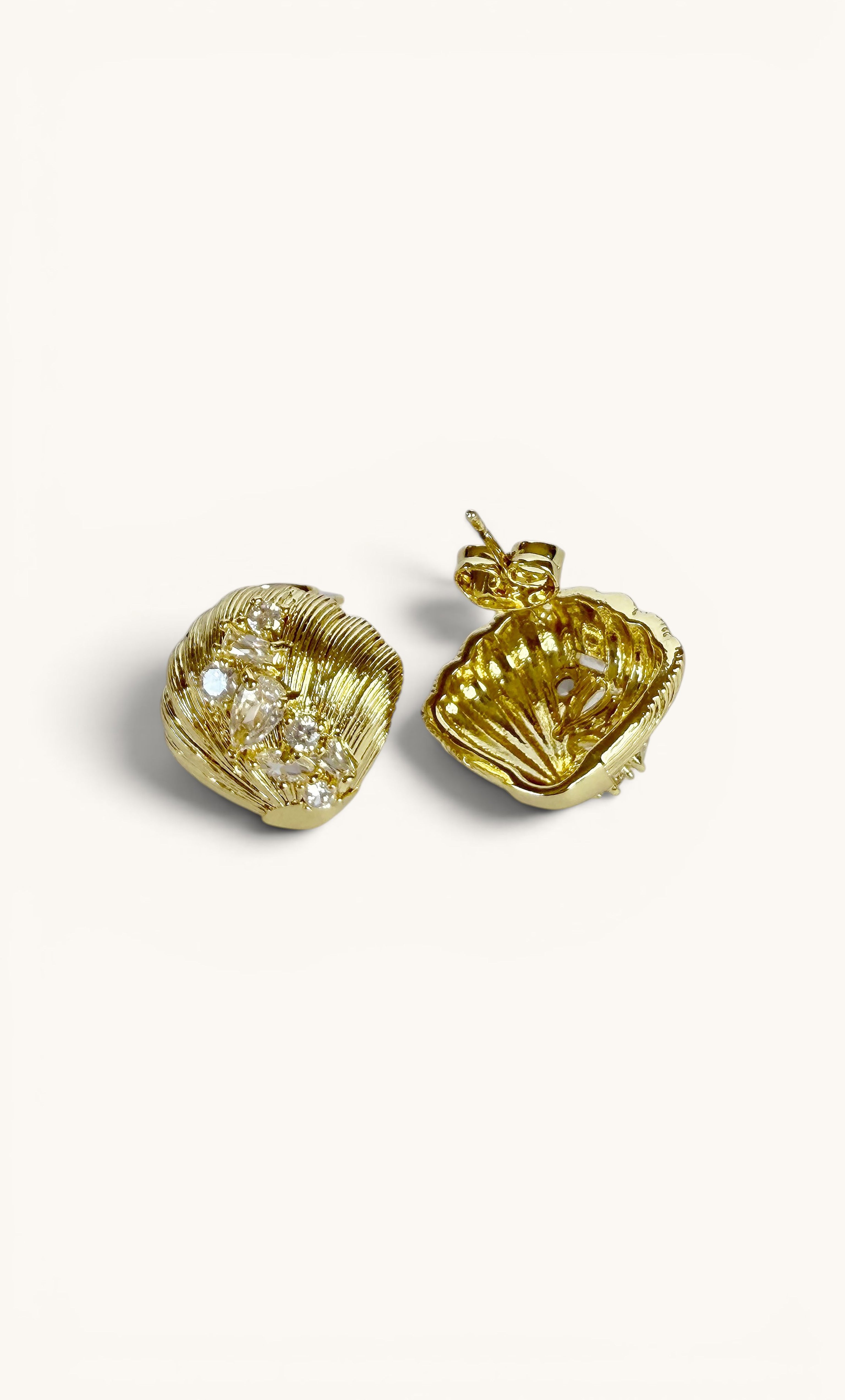 14k gold fill sea shell stud earrings with clear zirconia accents by Tunik.
