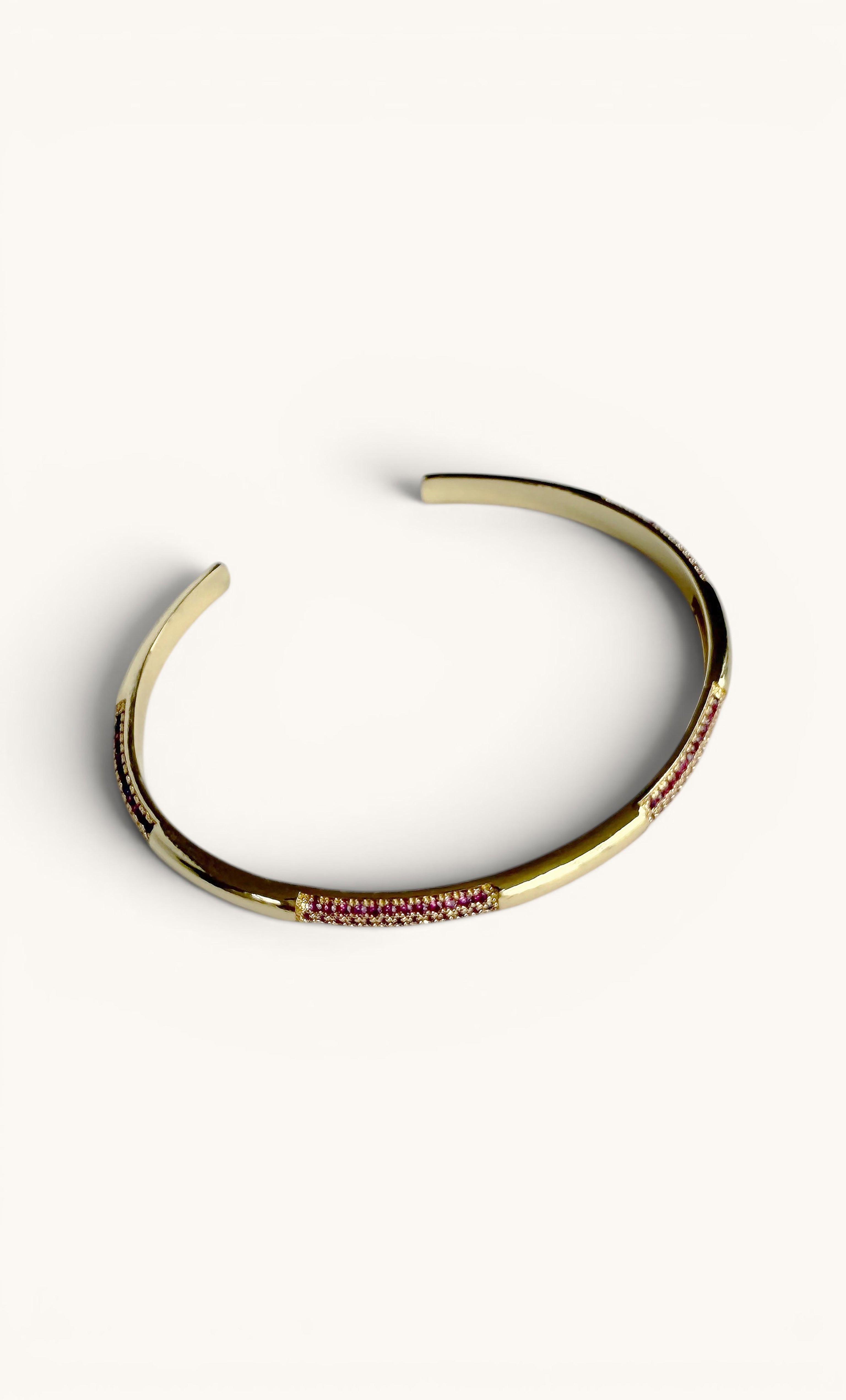 Gold-filled fine cuff bracelet with smooth finish and delicate textured detail by Tunik.