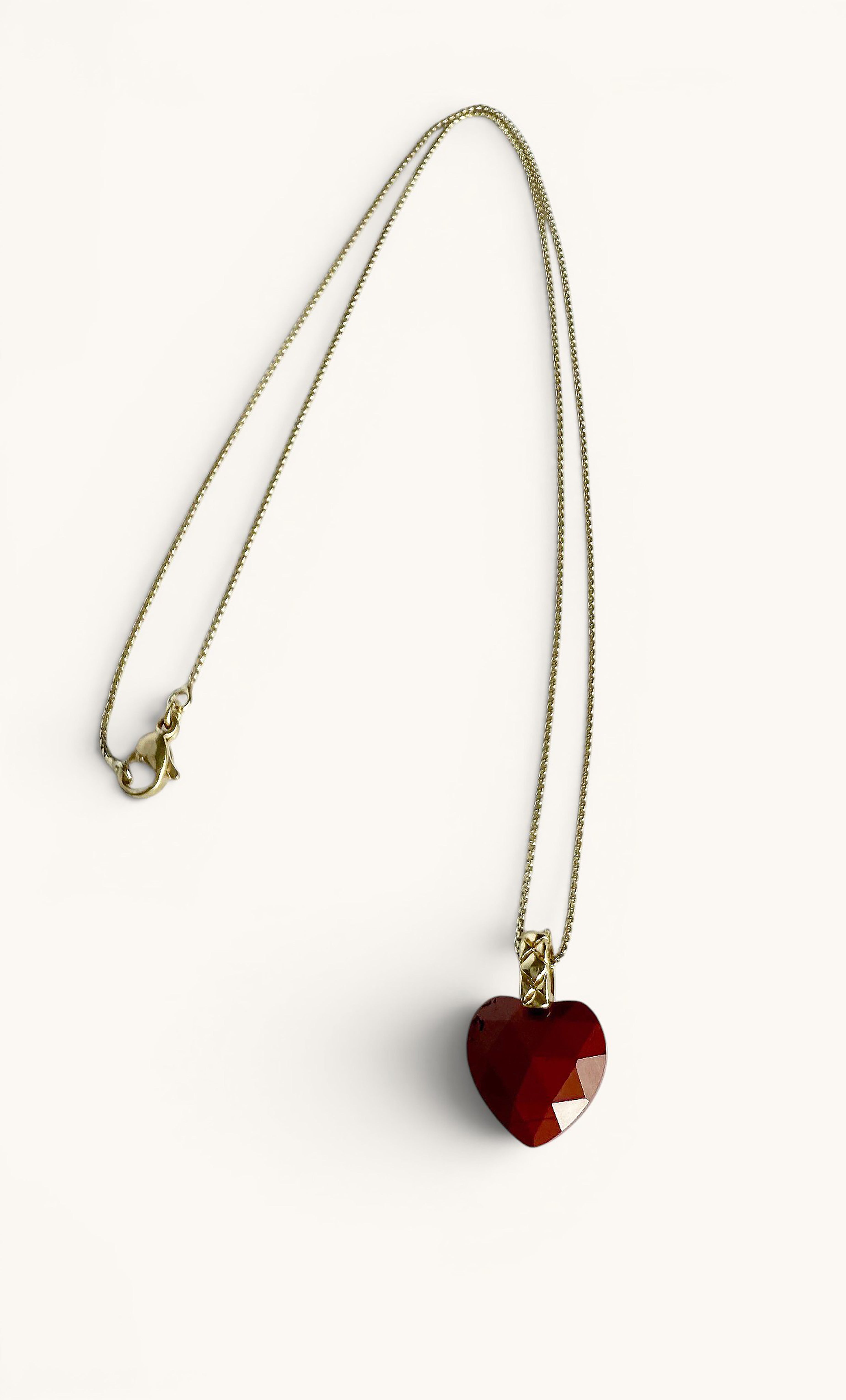 18K gold fill necklace with a carved deep red carnelian heart pendant.
