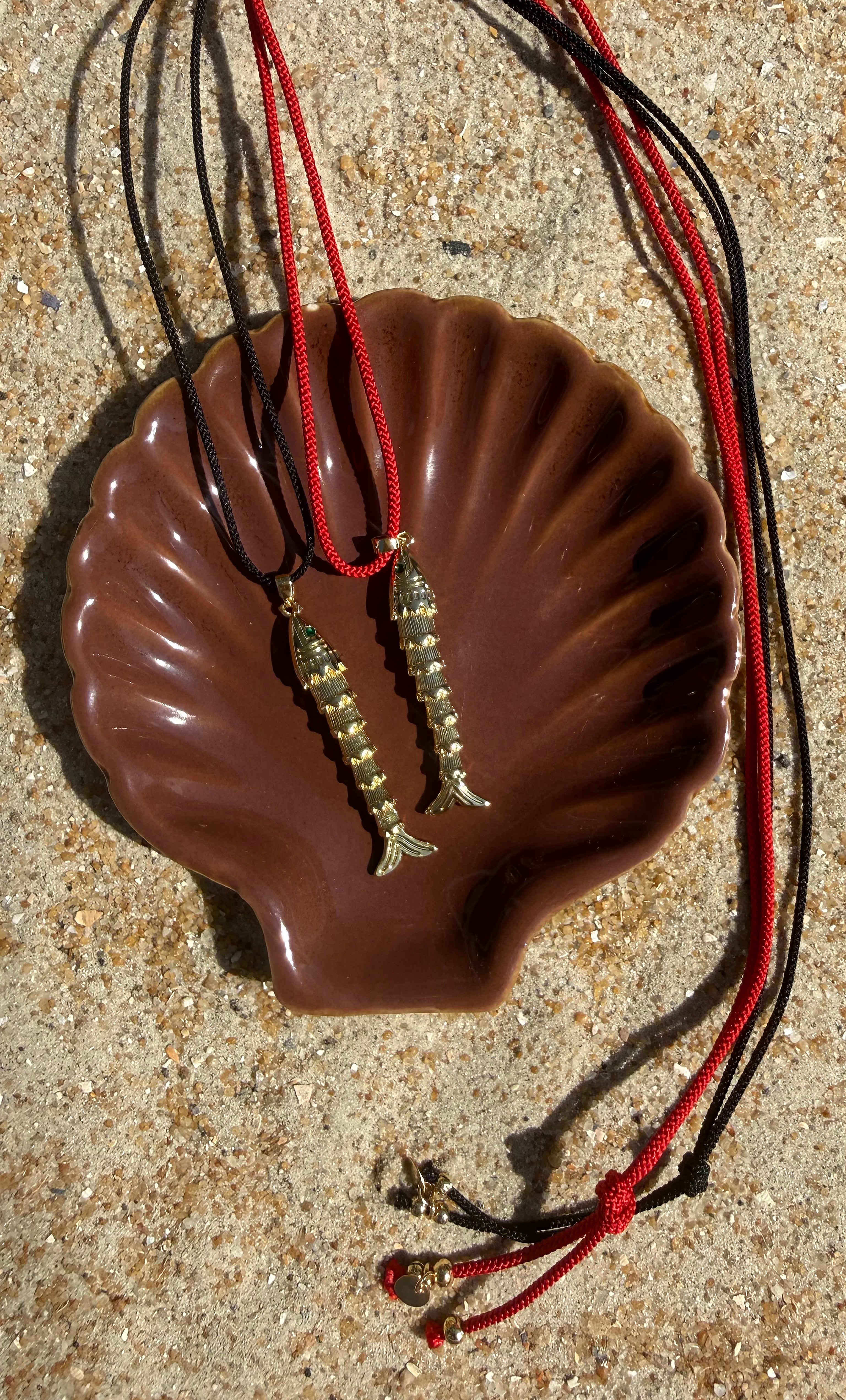 Koi fish gold fill pendant on black and red Japanese cord by Tunik jewellery gifts.