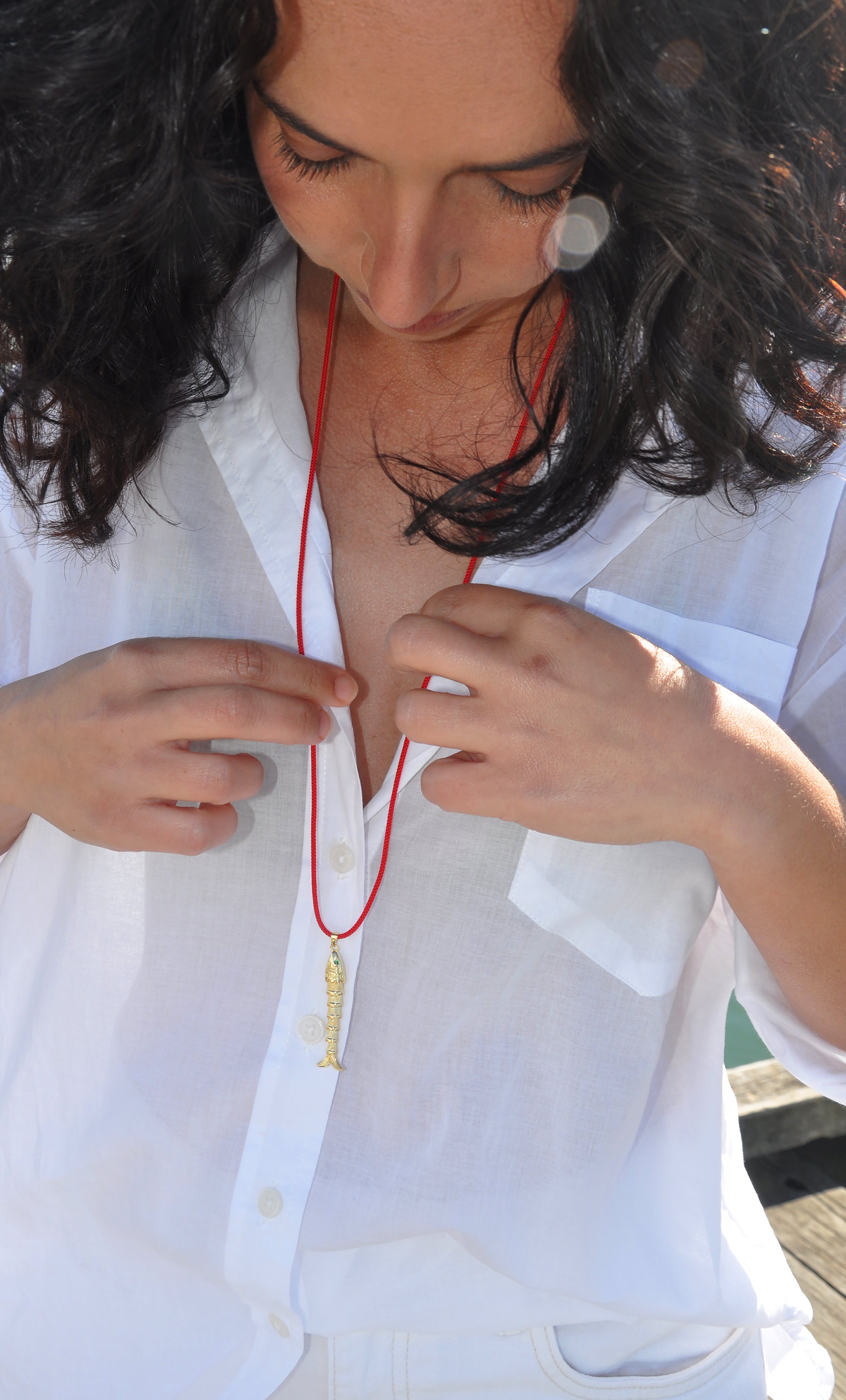 Red Japanese cord gold fill koi fish pendant necklace by Tunik worn with white shirt, jewellery gifts idea.