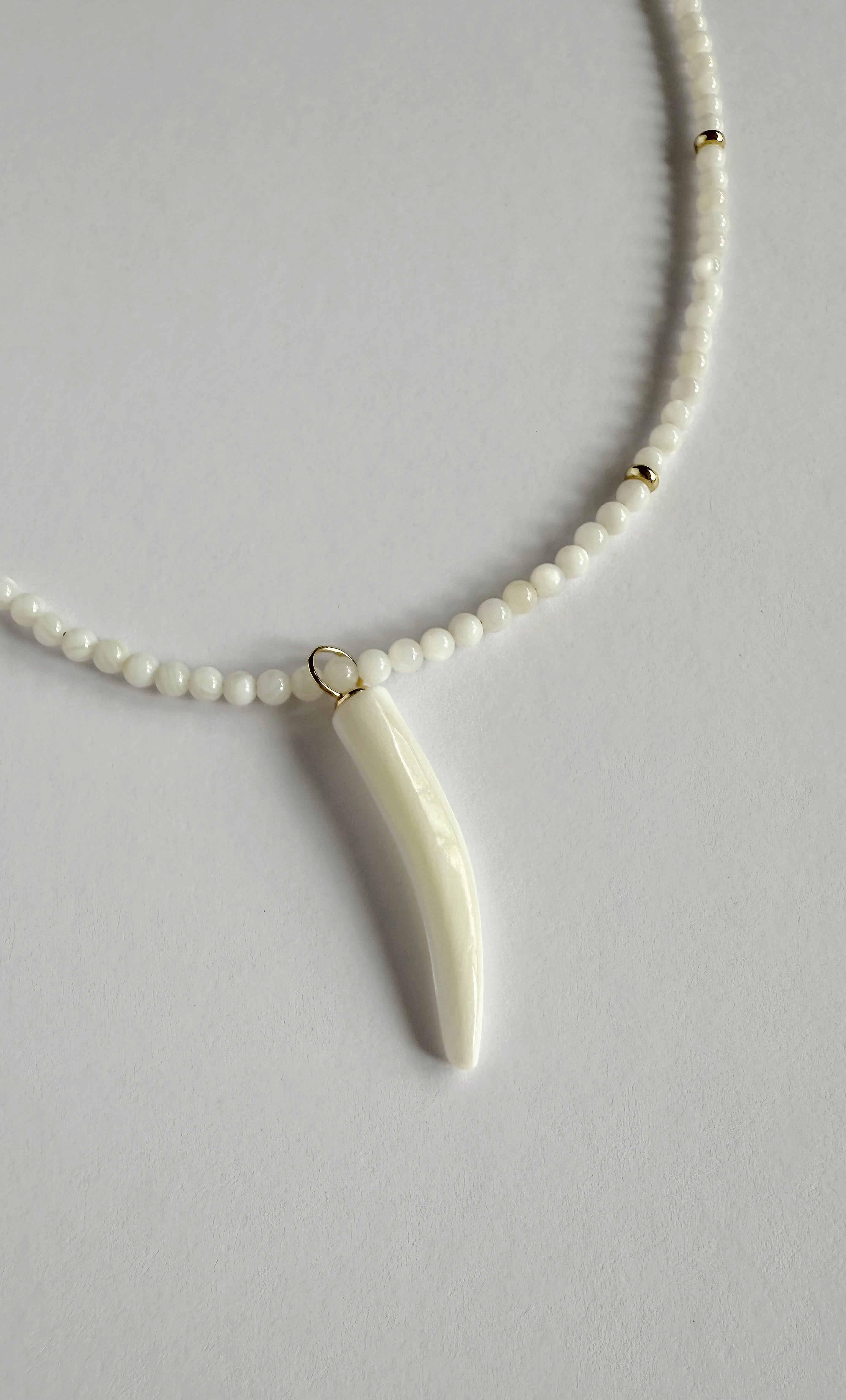 Mother of Pearl Carved Horn Charm Hand Beaded Necklace | Tunik