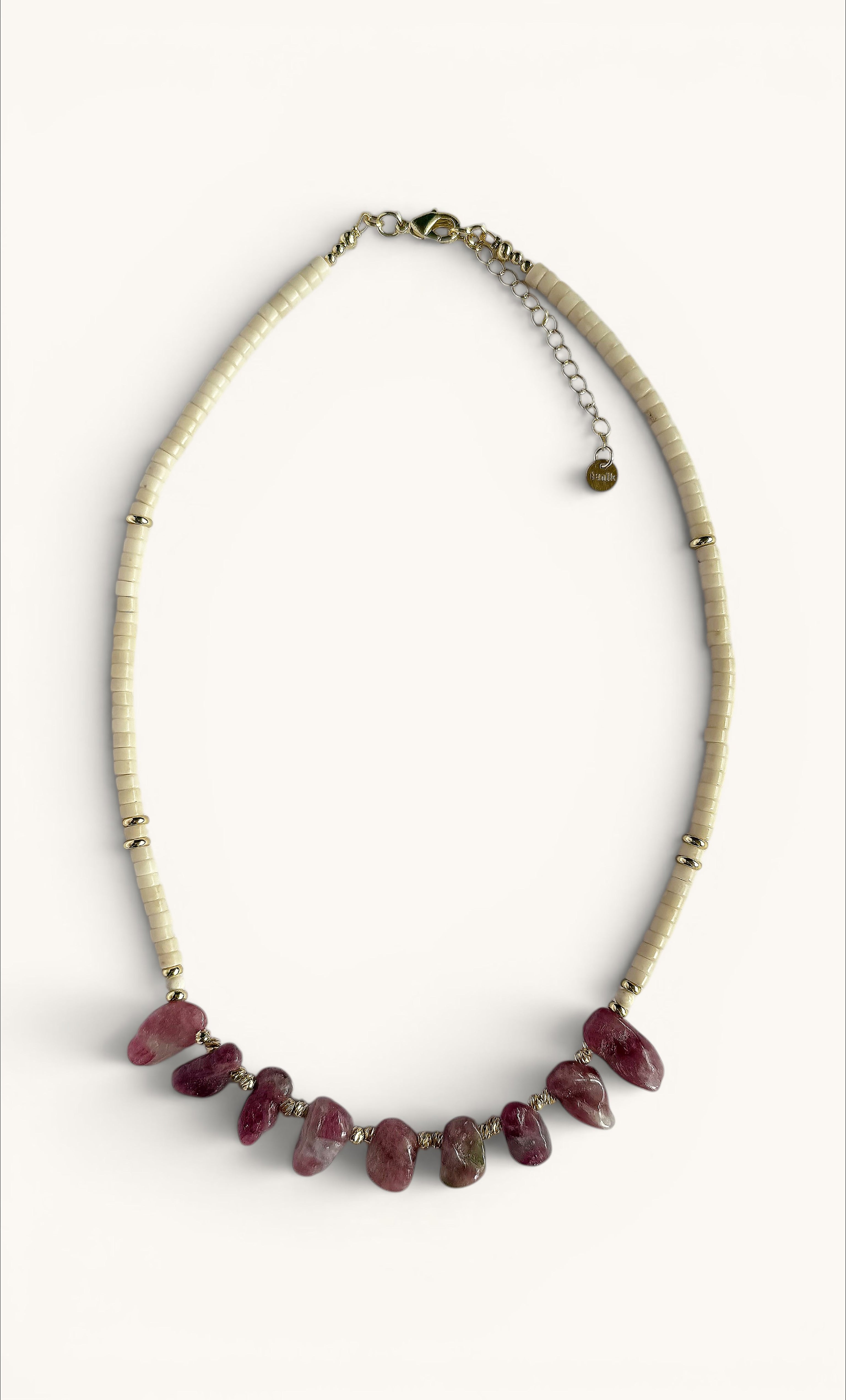 Handmade necklace with irregular pink tourmaline stones and small ivory jasper beads on gold fill chain.