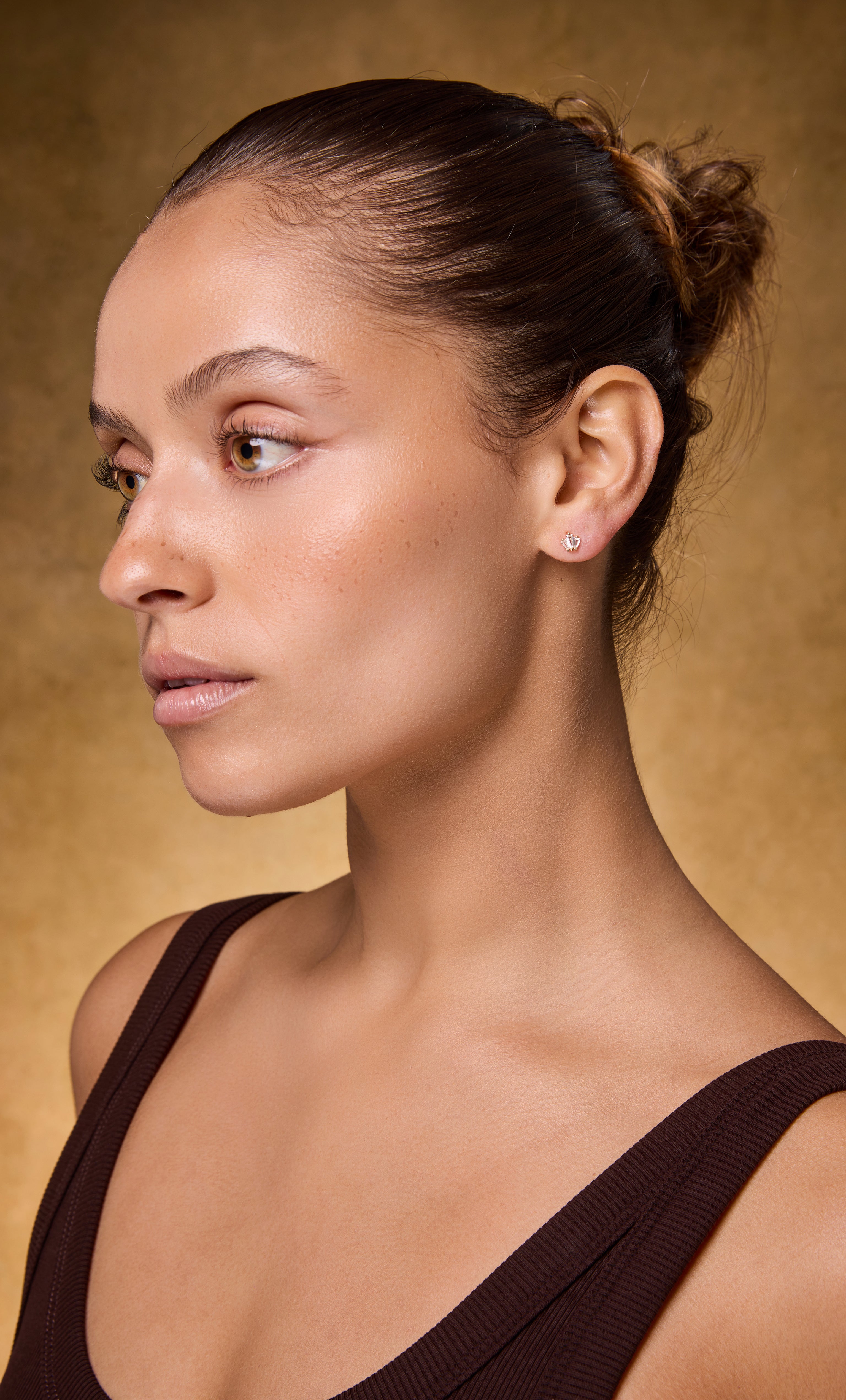 Elegant 14K gold fill Empire 3 stone zirconia stud earrings by Tunik, showcased with gold necklace jewelry gifts.