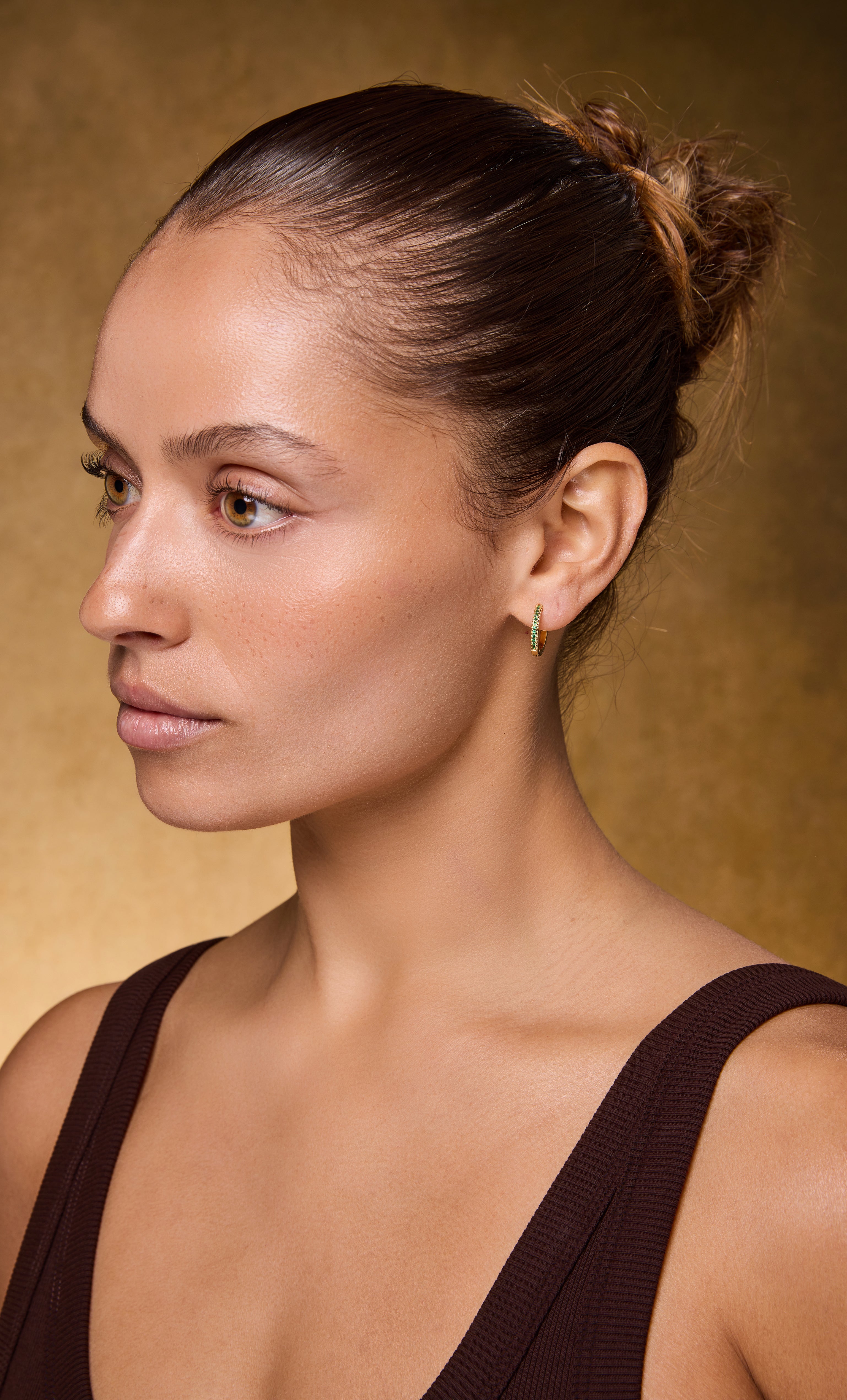 Gaia 24K gold fill zirconia stone huggie earrings on model, Tunik jewellery gifts style.