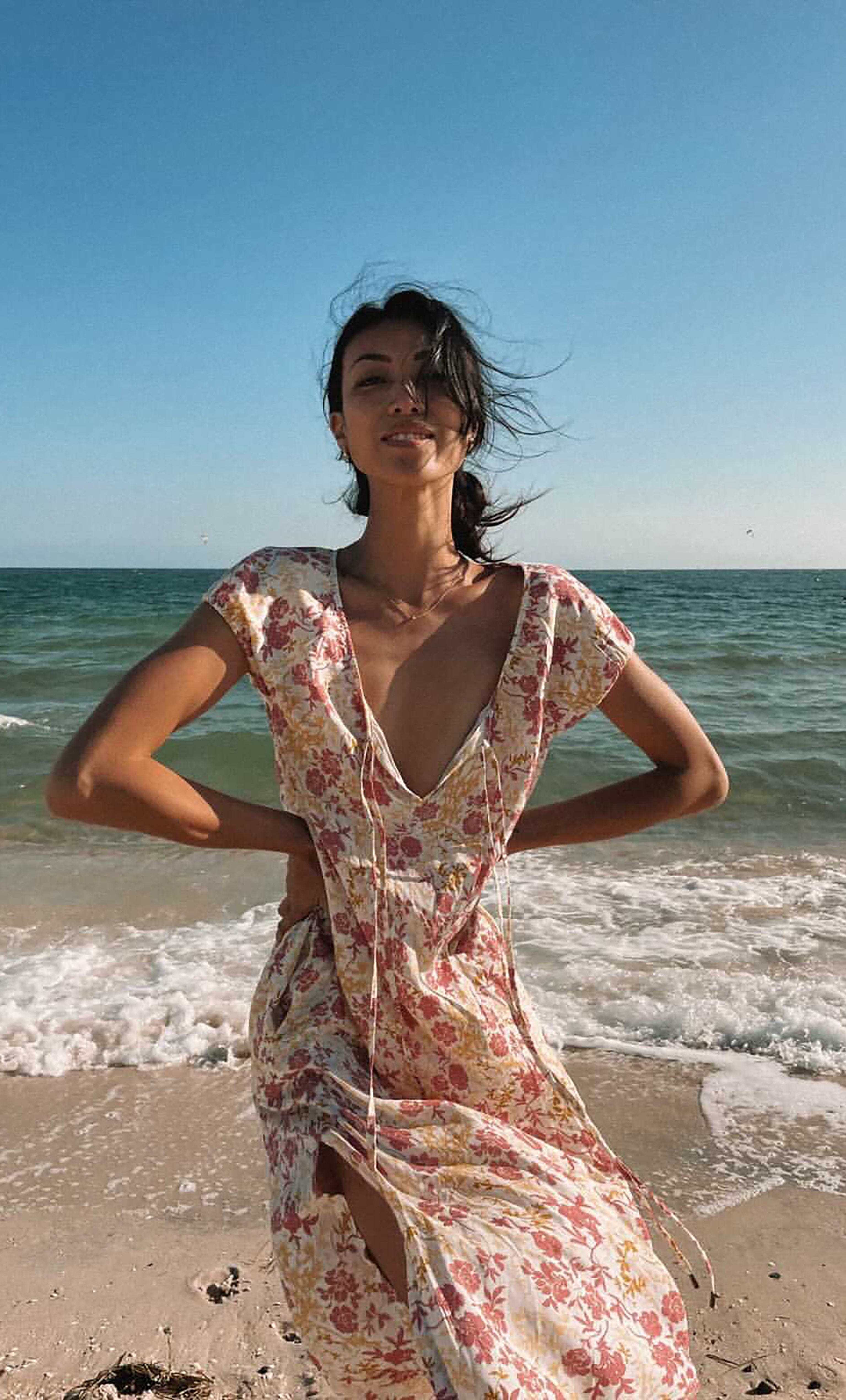 Aurelia Ruffle Cover Up Dress by Tunik with summer floral blooms print, worn with gold fill necklace from Tunik the Label.