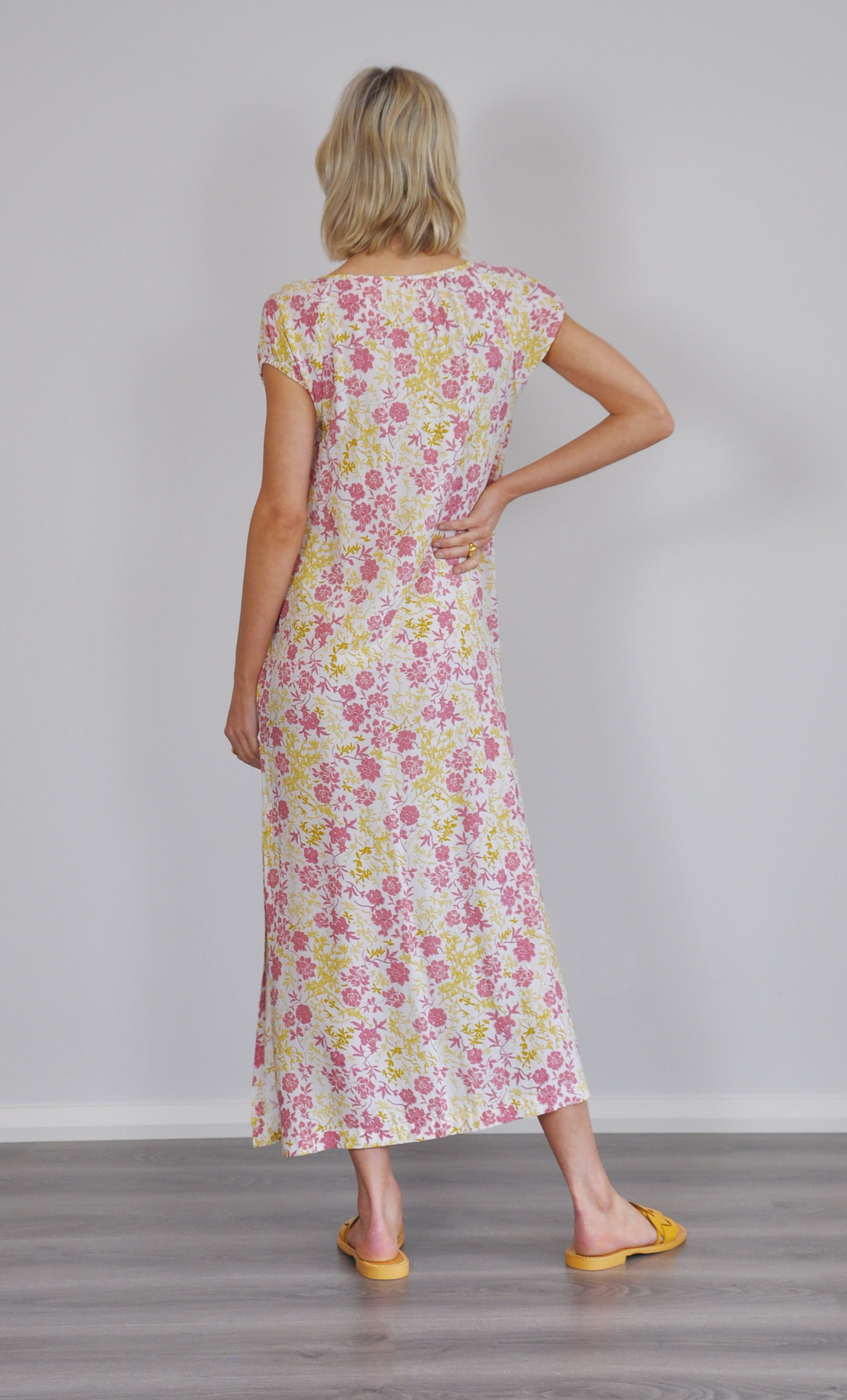 Aurelia Ruffle Cover Up Dress by Tunik in summer floral blooms print, paired with gold fill jewellery and a gold necklace by .