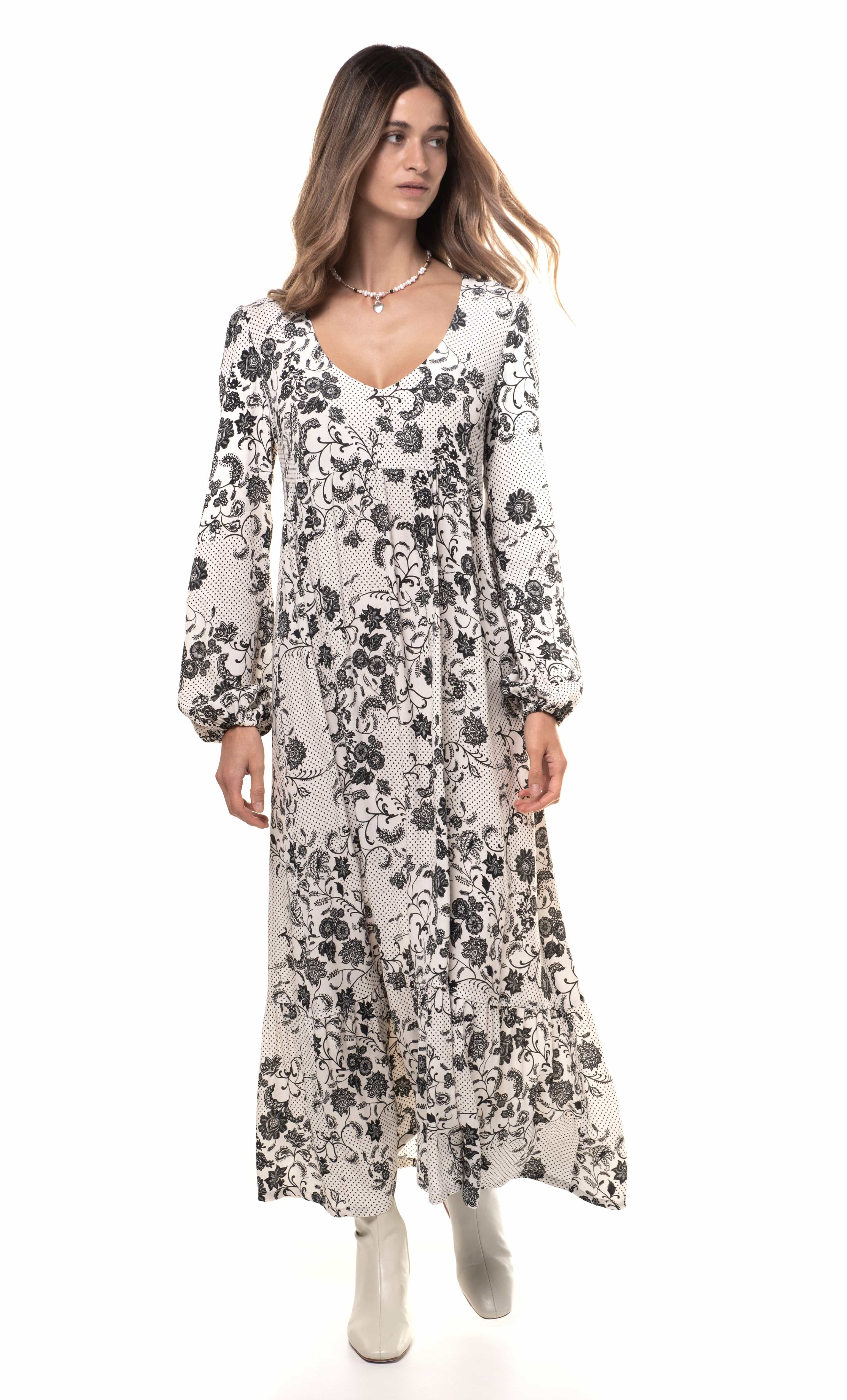 White and black paisley floral Lola maxi dress by Tunik with long sleeves and V-neck, styled with gold fill necklace from.