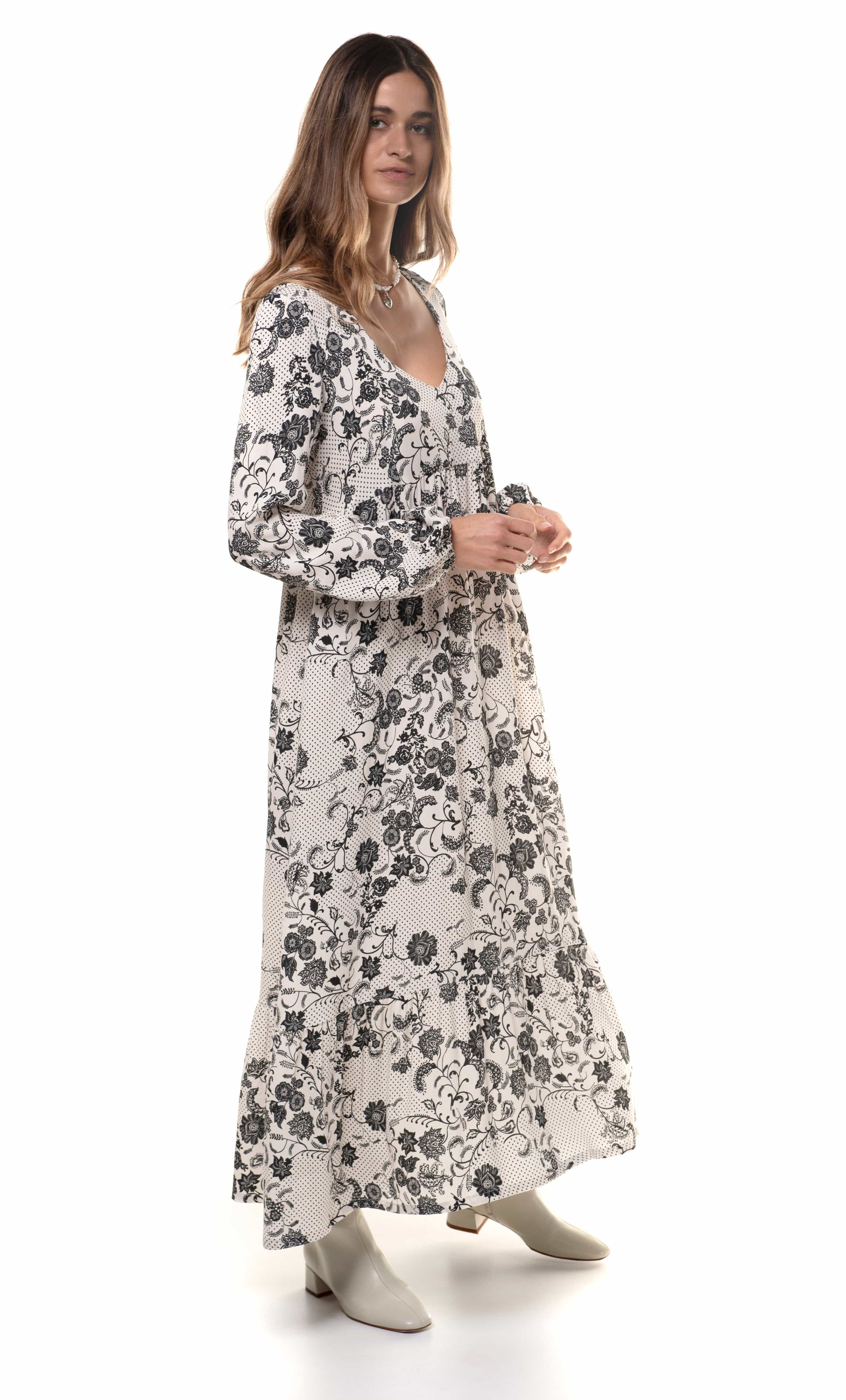Lola maxi dress by Tunik with black paisley floral print, paired with gold fill necklace from Tunik the Label.
