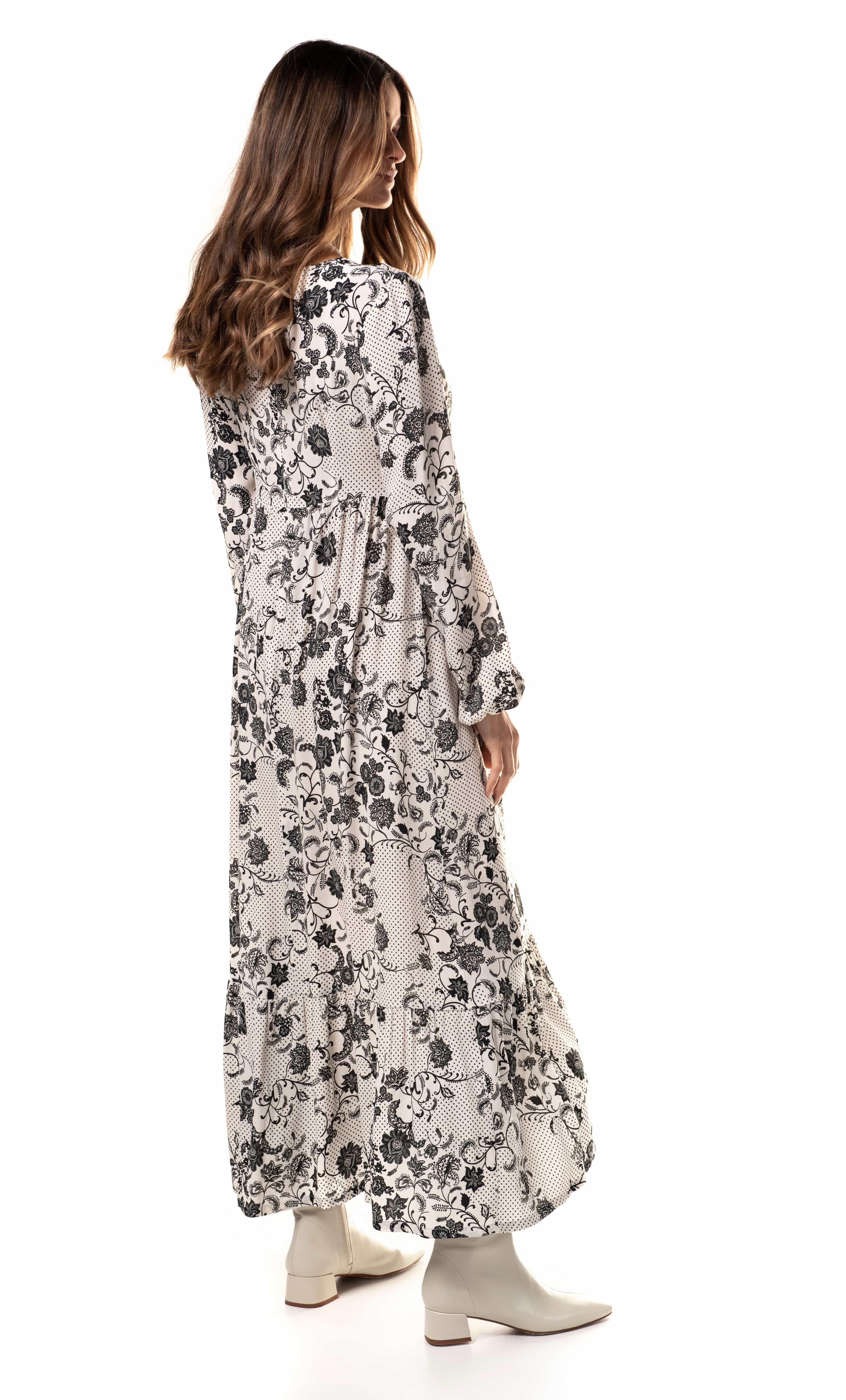 Tunik Lola Maxi Dress in neutral paisley floral print paired with gold fill necklace by Tunik the Label and beige boots.