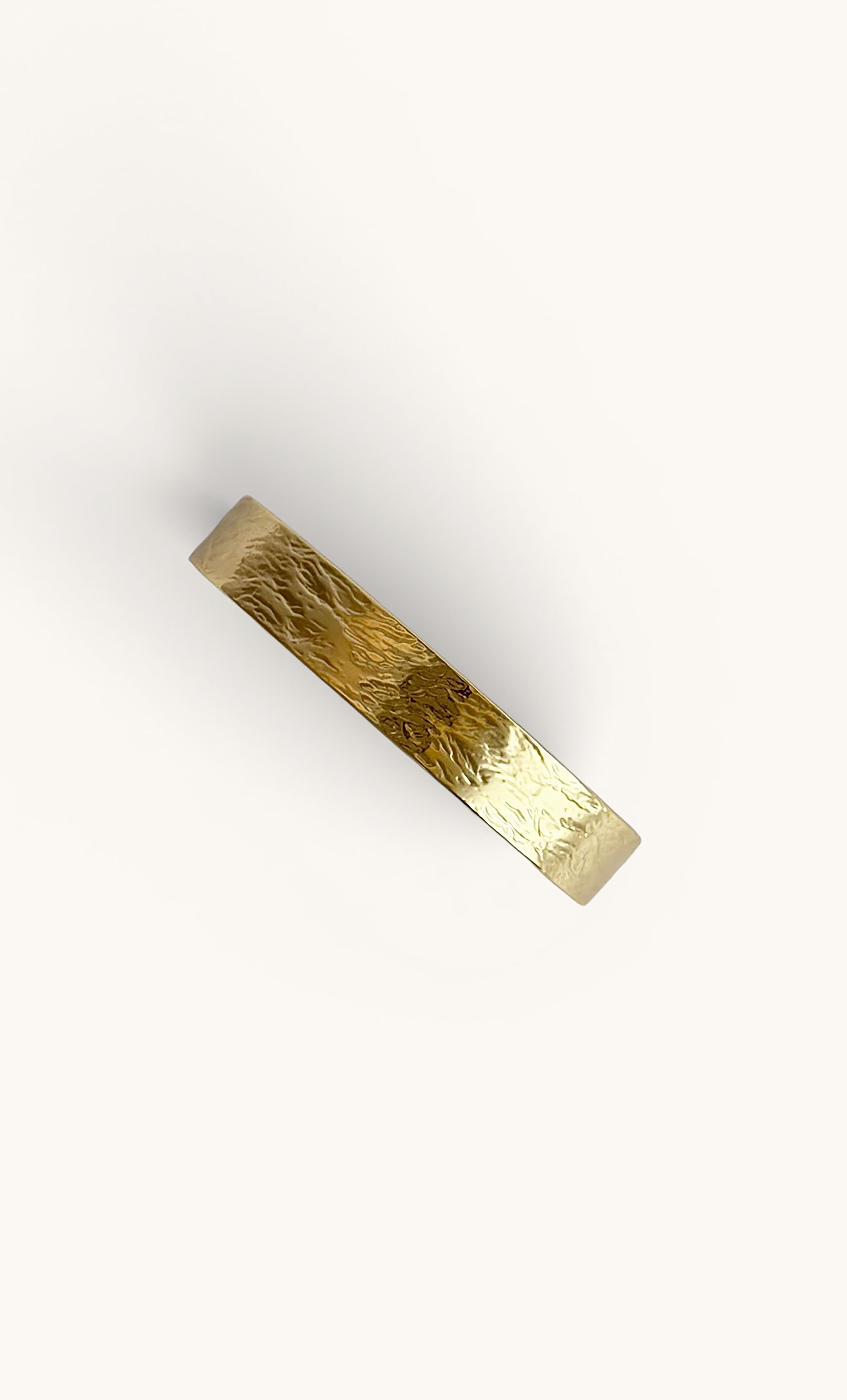 18K gold fill hammered cuff bangle bracelet by Tunik, shiny textured finish, elegant jewellery gift.