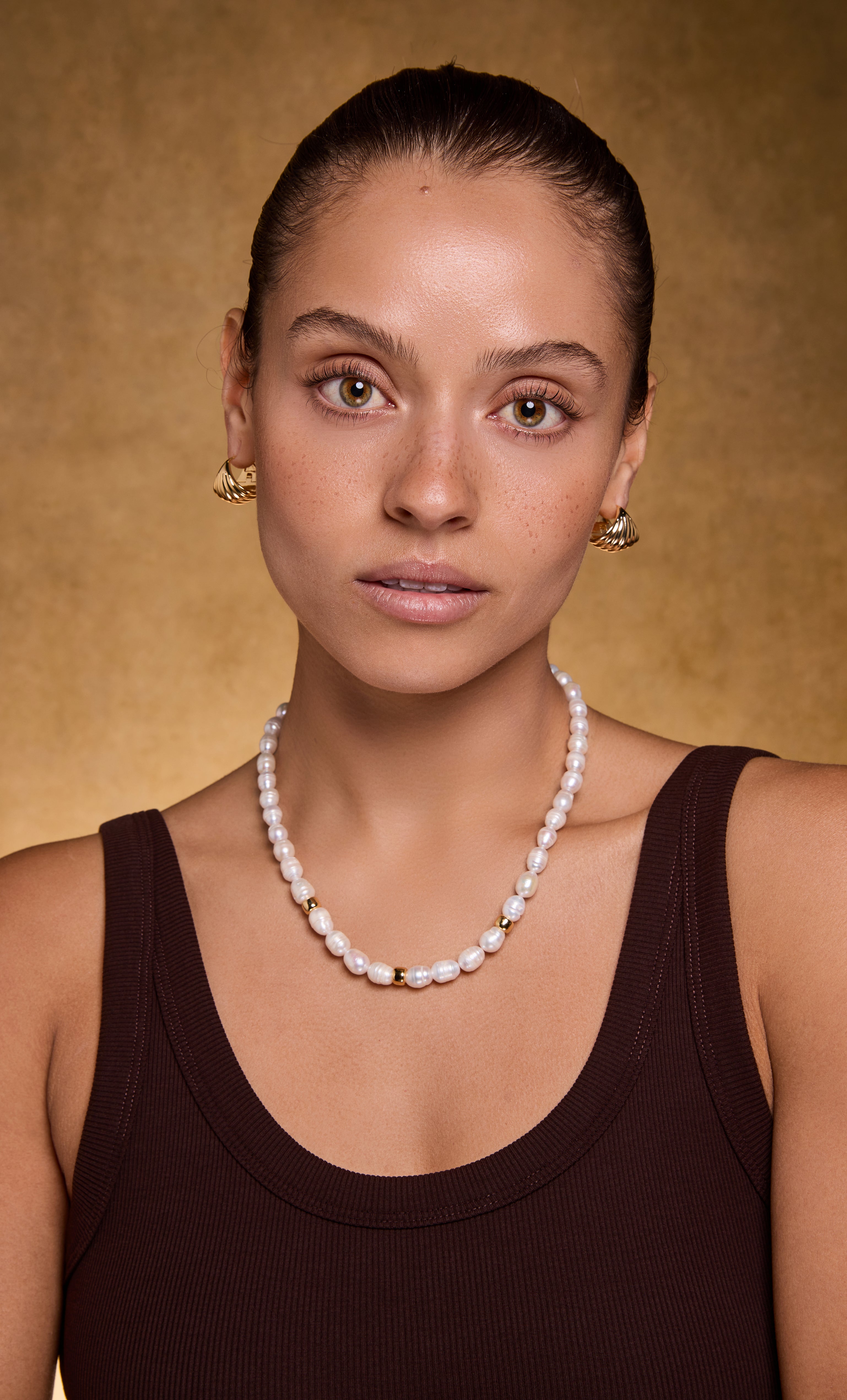 Sculpt 18K gold fill shell huggie earrings by Tunik paired with pearl gold necklace jewelry gifts.