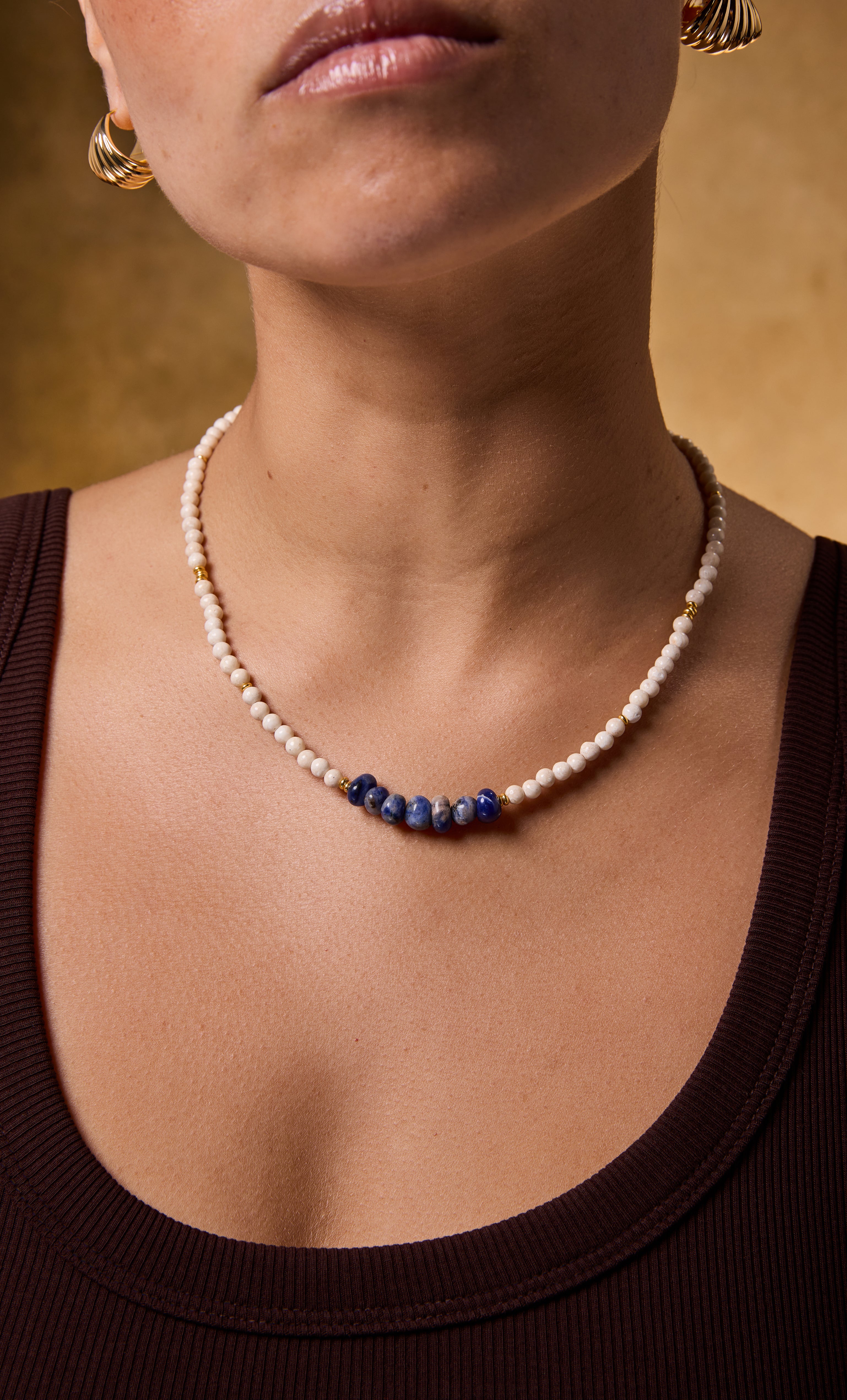 Tunik gold fill necklace with blue sodalite and fossil stone beads, elegant jewellery gift.