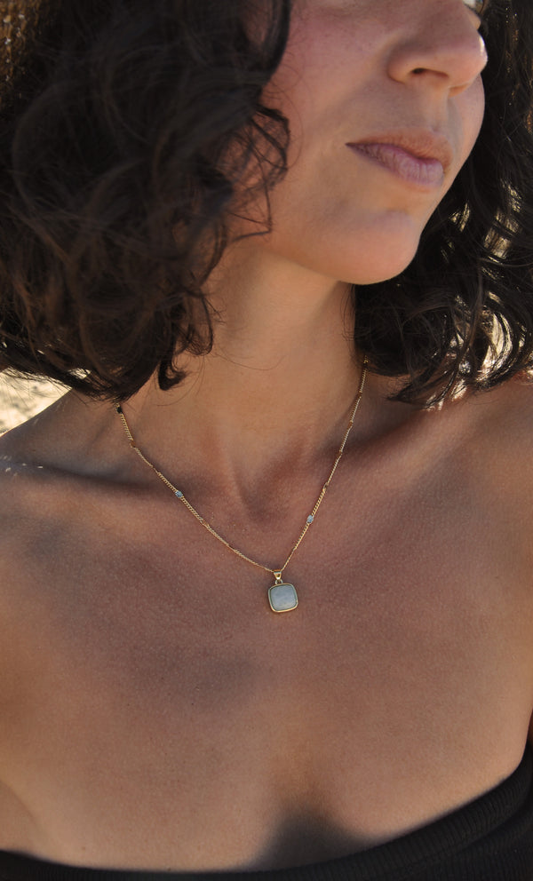 The Tunik Blue Agate Crystal Charm Pendant Necklace
