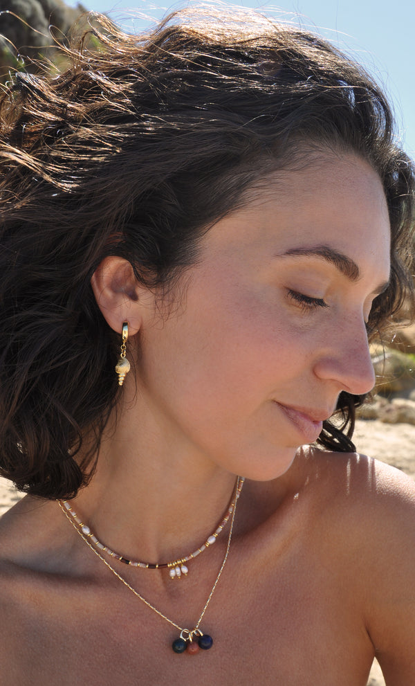 The Tunik Spiral Shell Huggie Earrings - Limited Edition