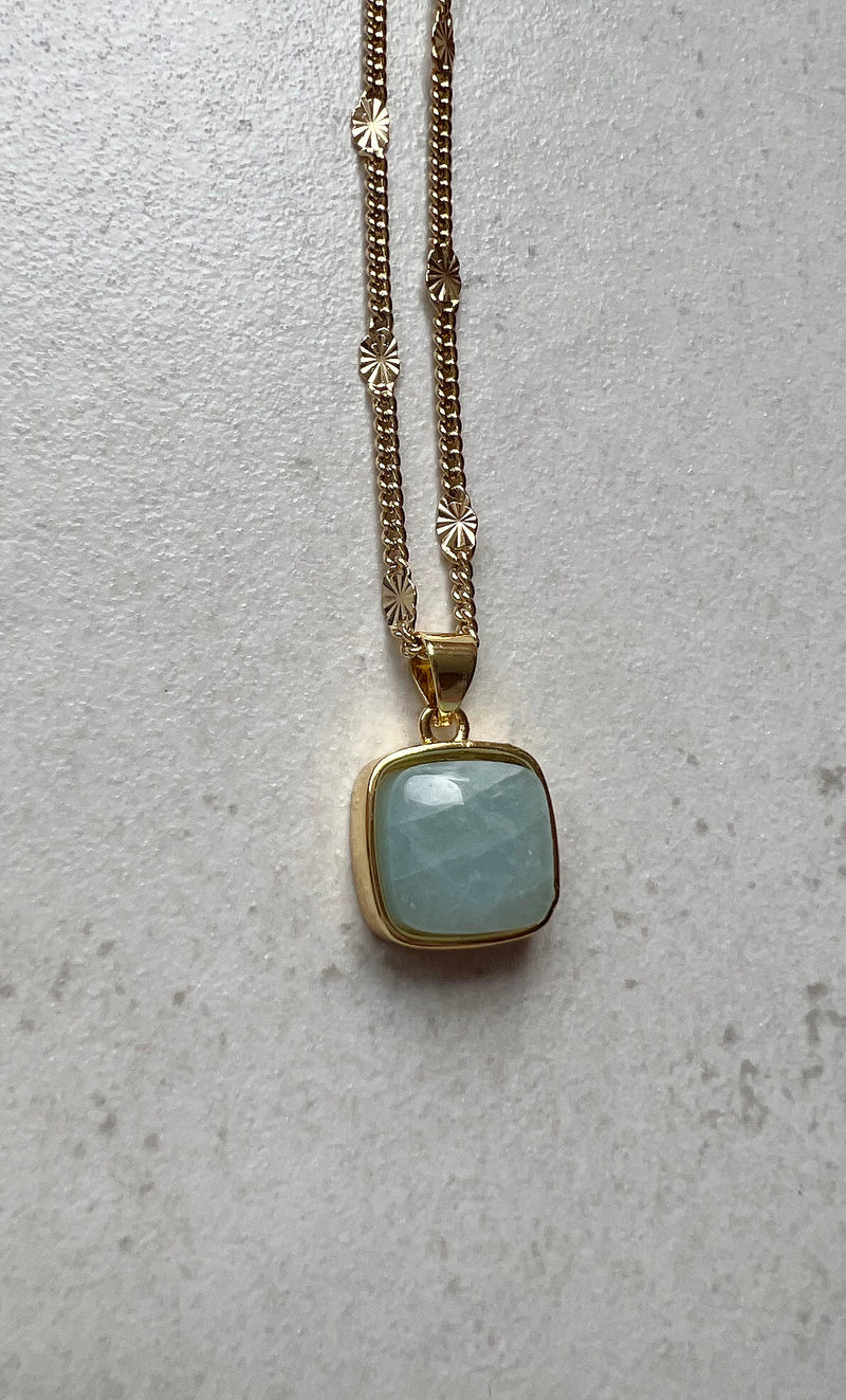 The Tunik Blue Agate Crystal Charm Pendant Necklace