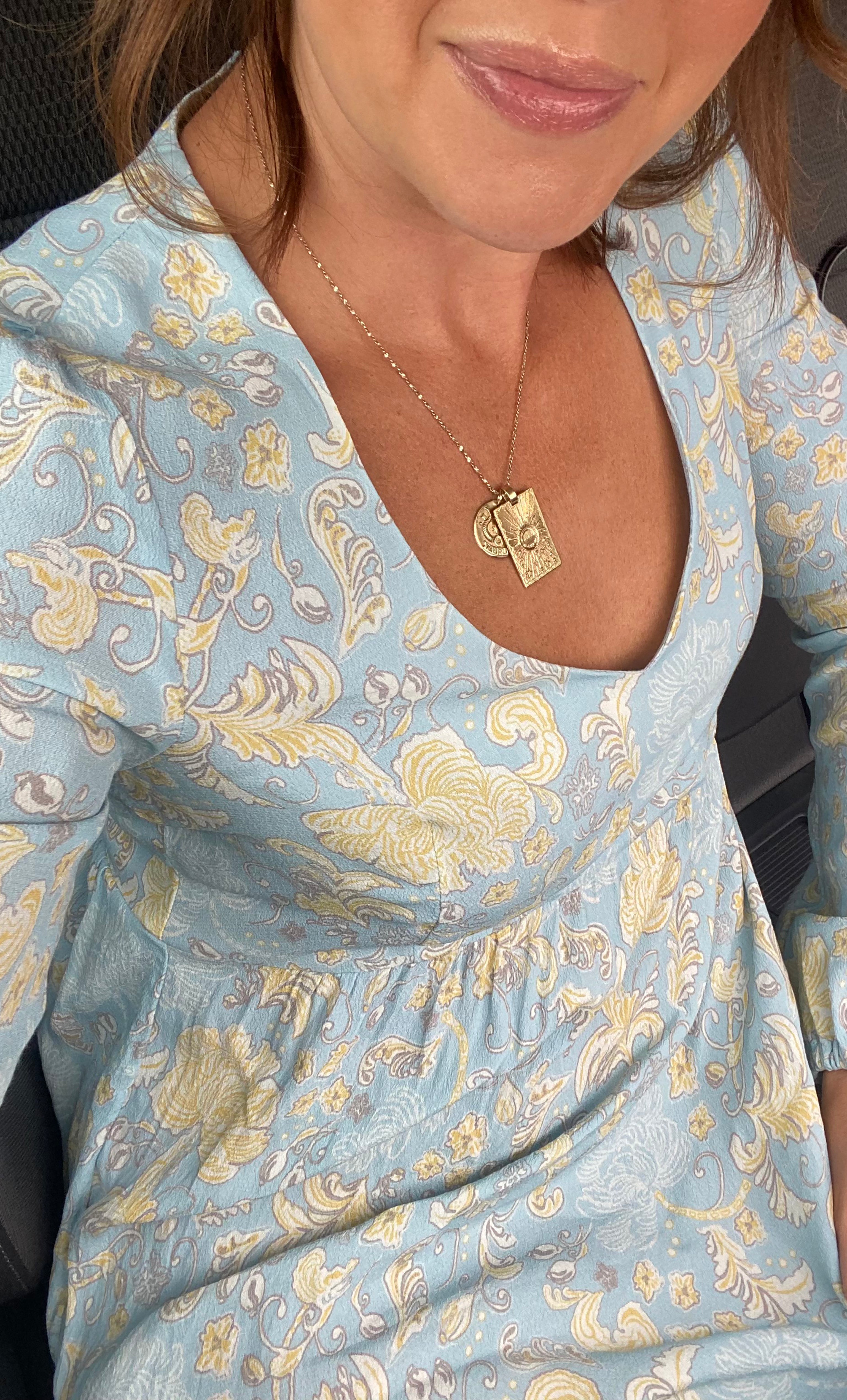 Light blue Mystic Floral Aquamarine Tunik Lola maxi dress with gold fill heart pendant necklace from Tunik The Label.