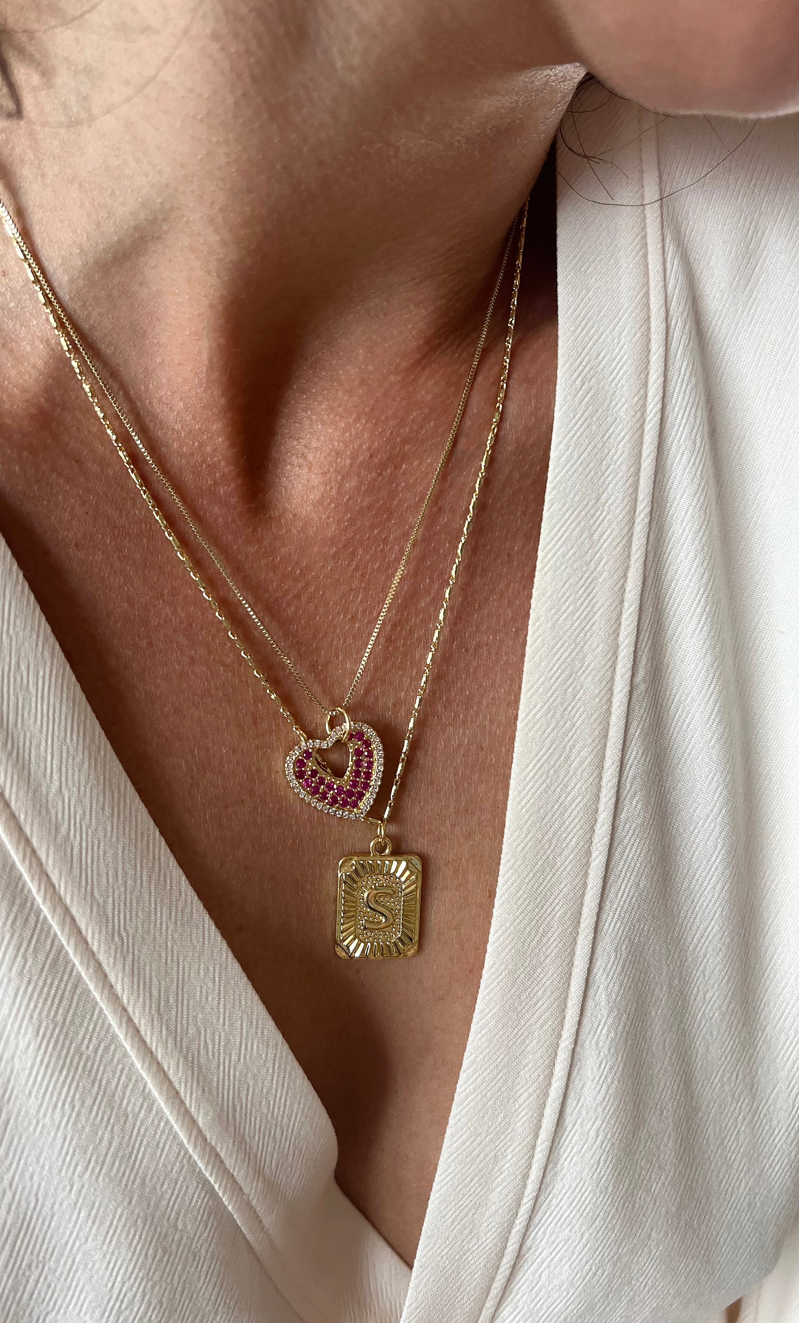 The Tunik Roaming Hearts Necklace