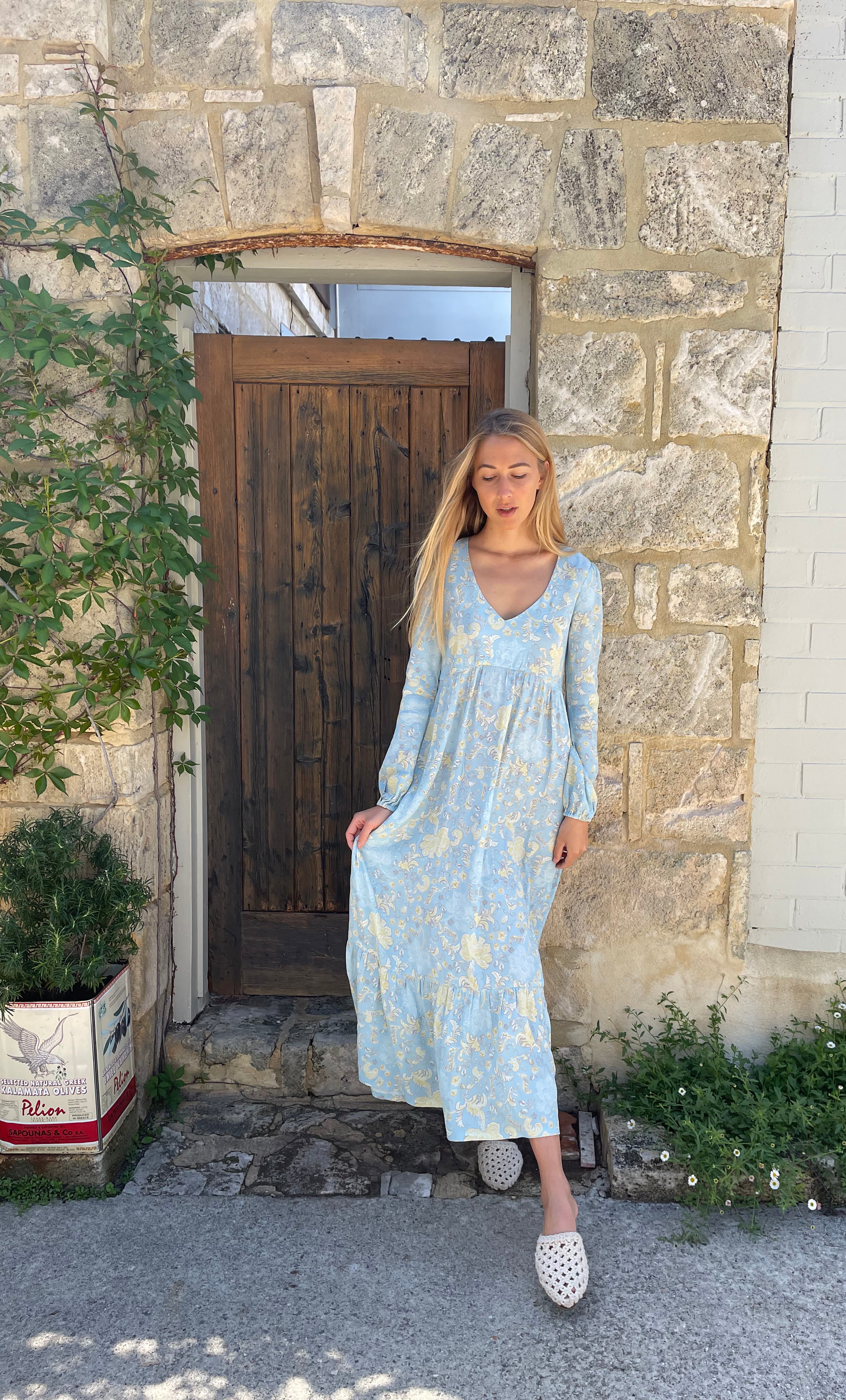 Tunik Lola maxi dress in Mystic Floral Aquamarine print with gold fill necklace from Tunik The Label.