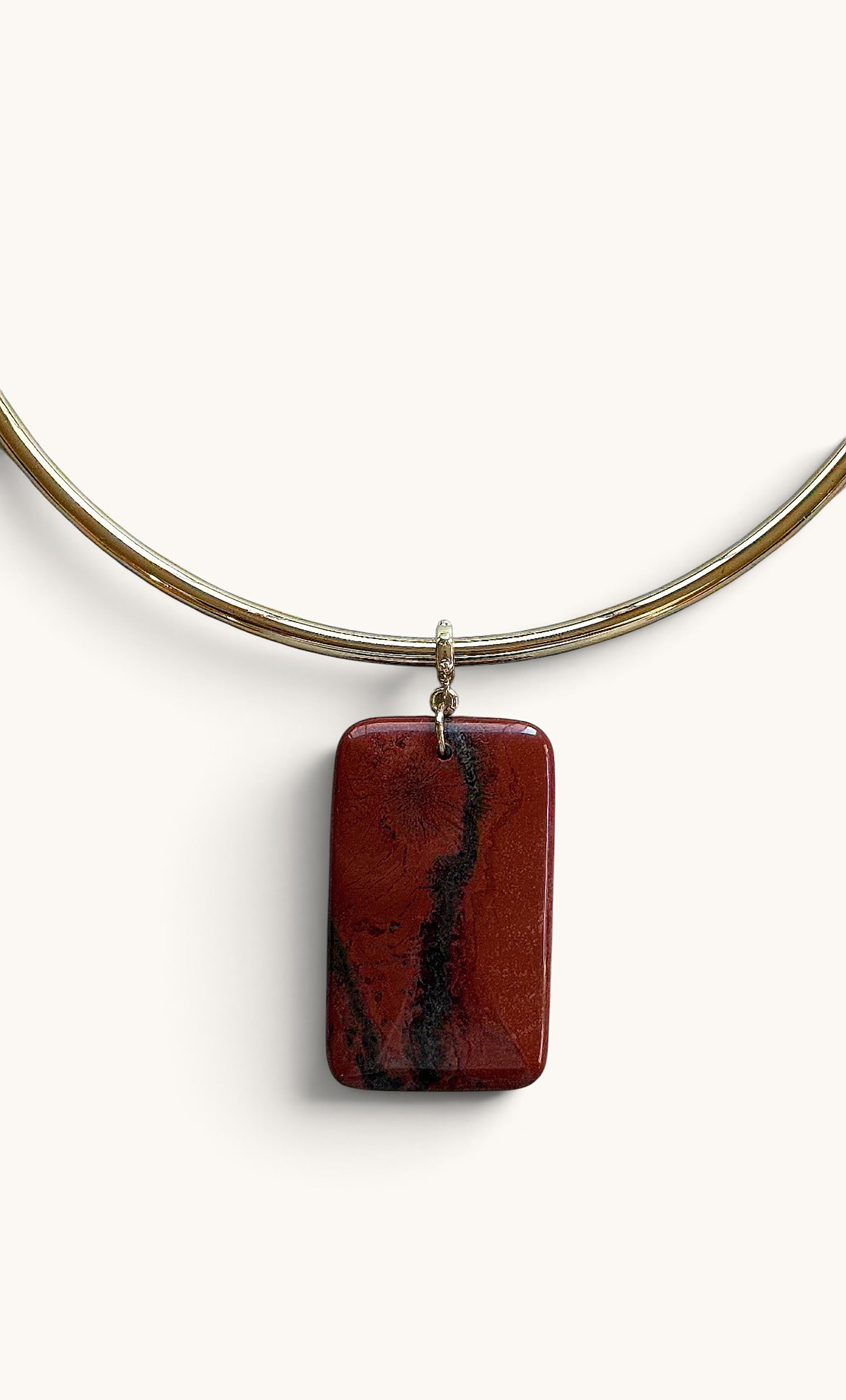 Gold fill collar necklace with rectangular deep red jasper pendant featuring black natural veins.
