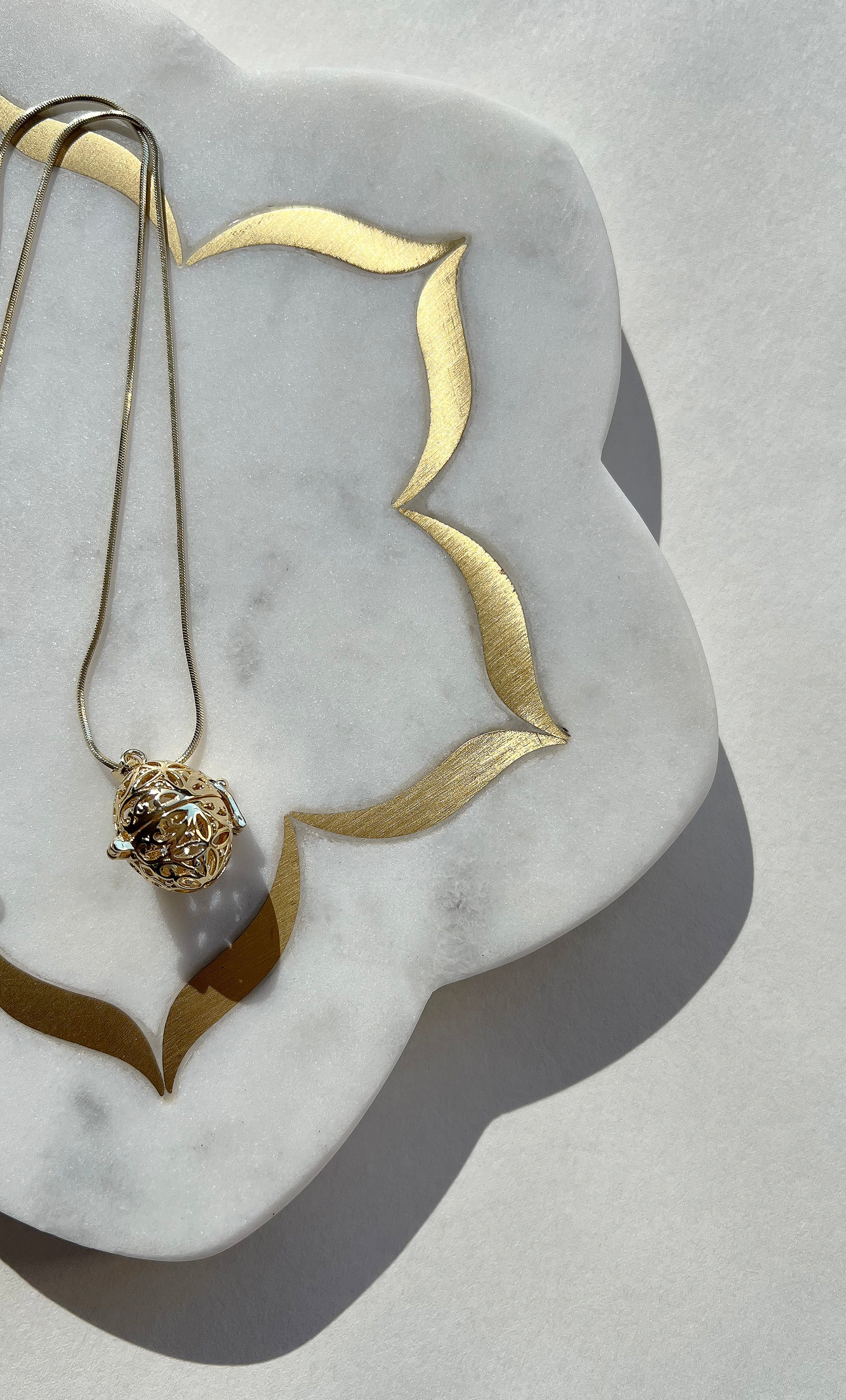 The Tunik Cage Locket Pendant Necklace