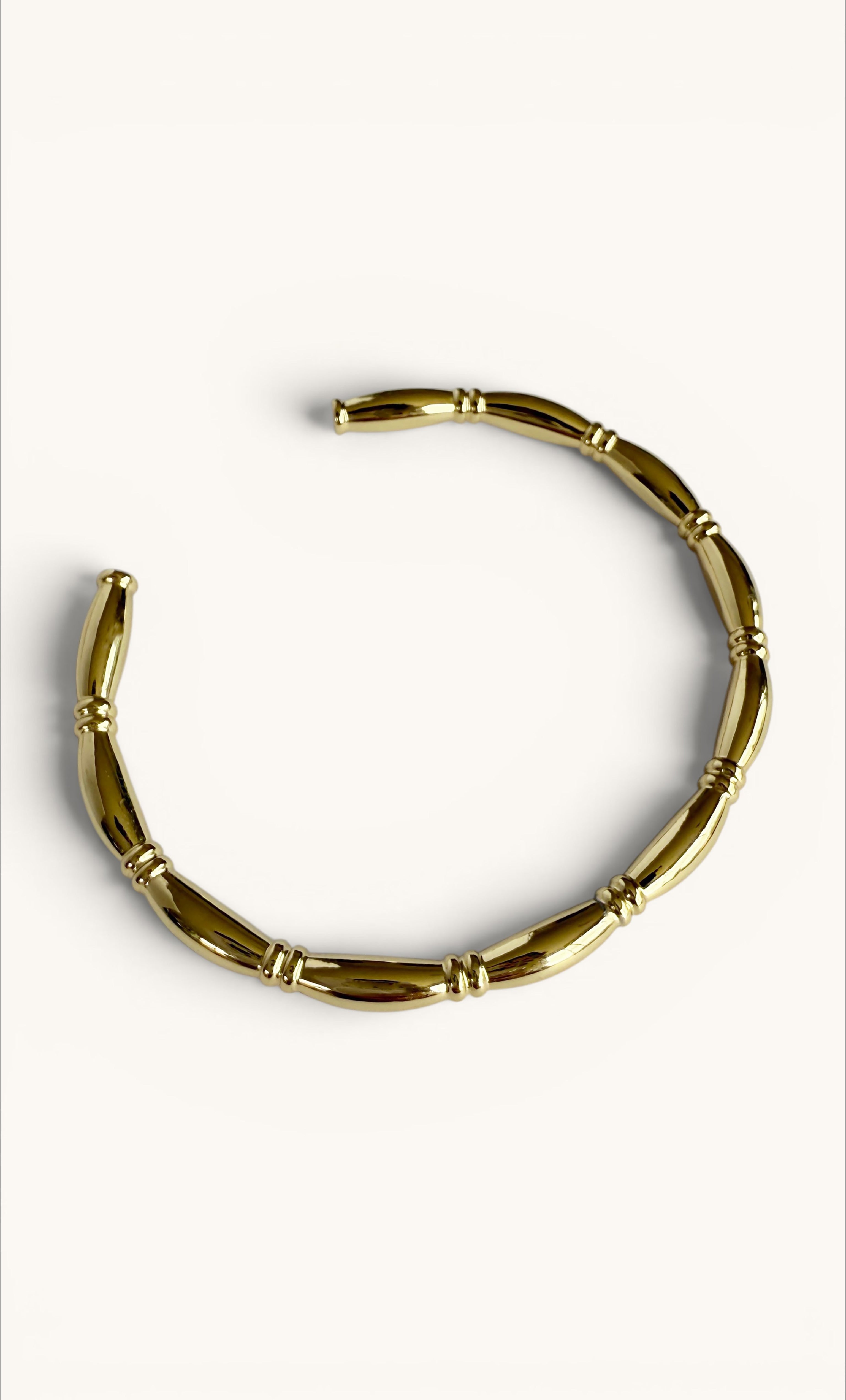 14K gold fill cuff bracelet with tubular linked design by Tunik.