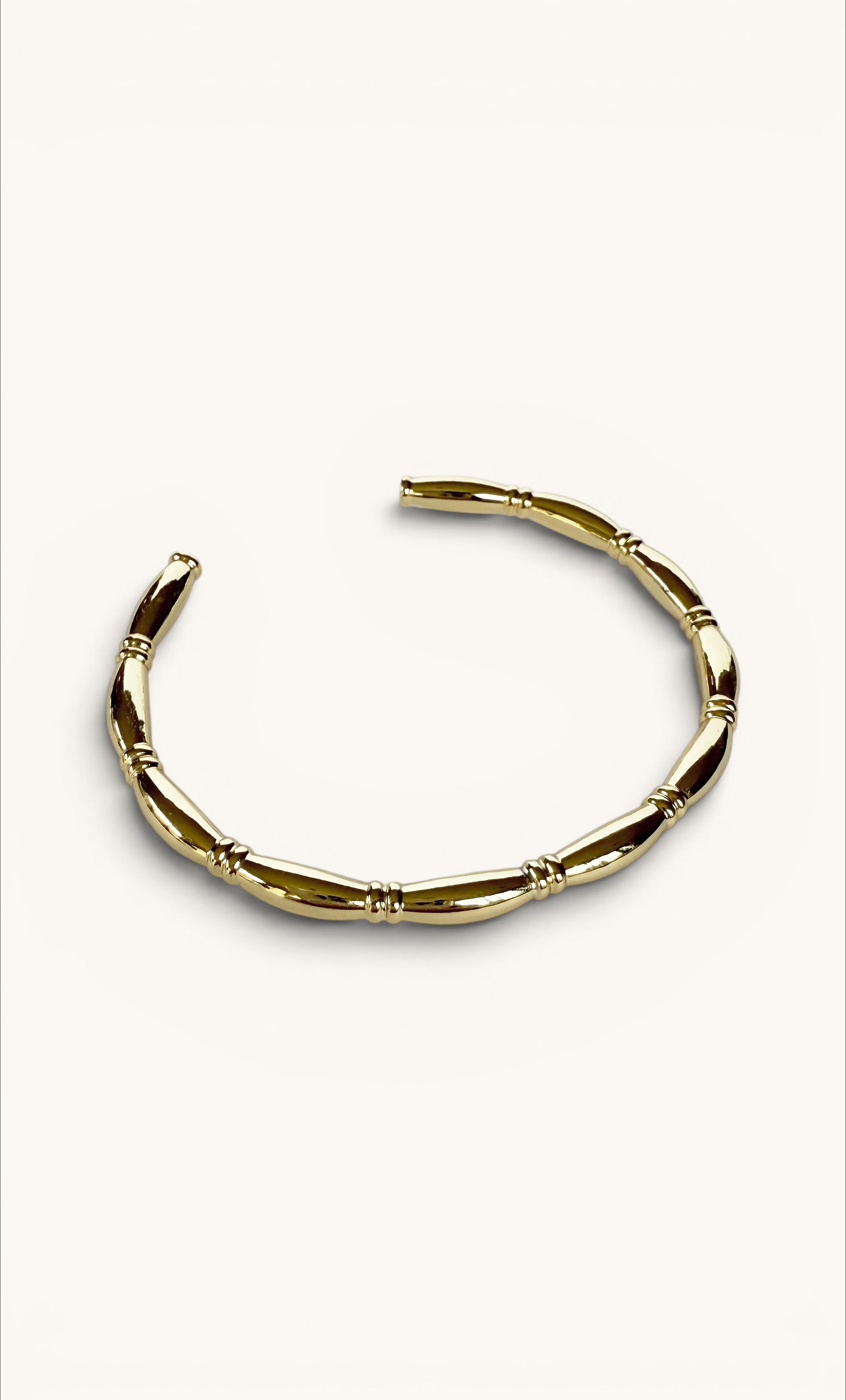 14K gold fill cuff bracelet with bamboo-inspired textured design by Tunik.