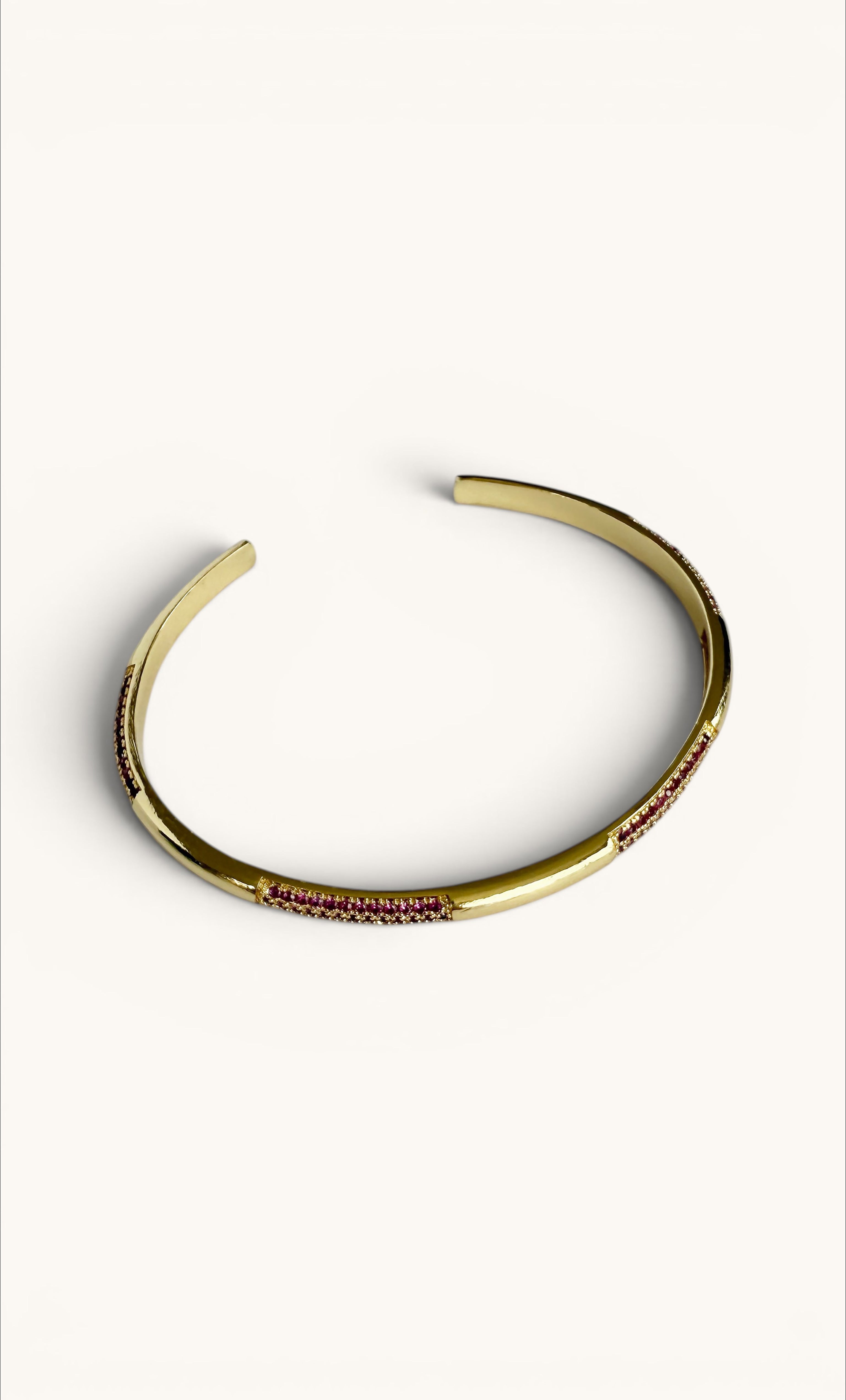 24K gold filled fine cuff bracelet with smooth polished finish and subtle engraved accents.