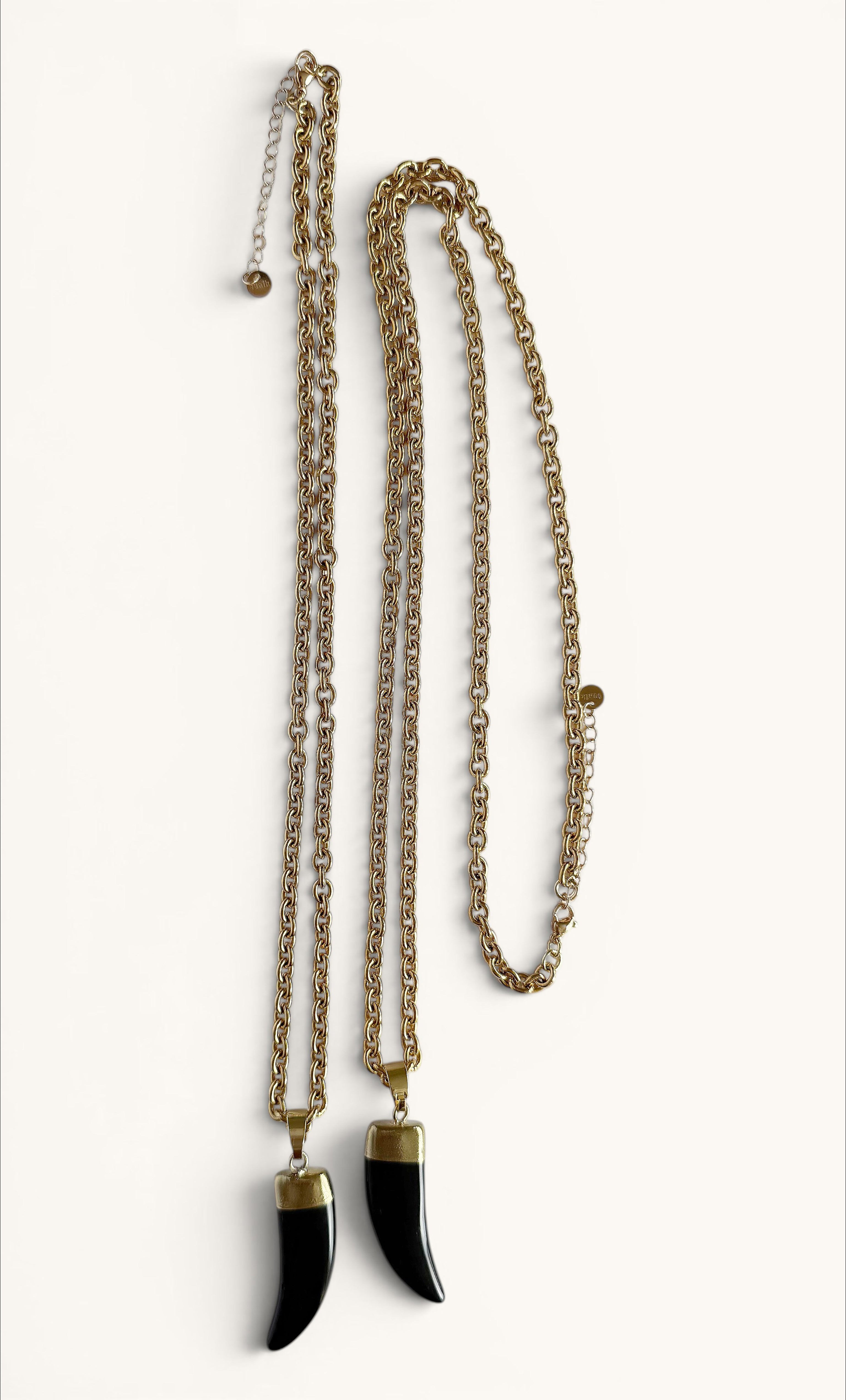 Long and short 24K gold fill chains with black carved agate horn pendants by Tunik.