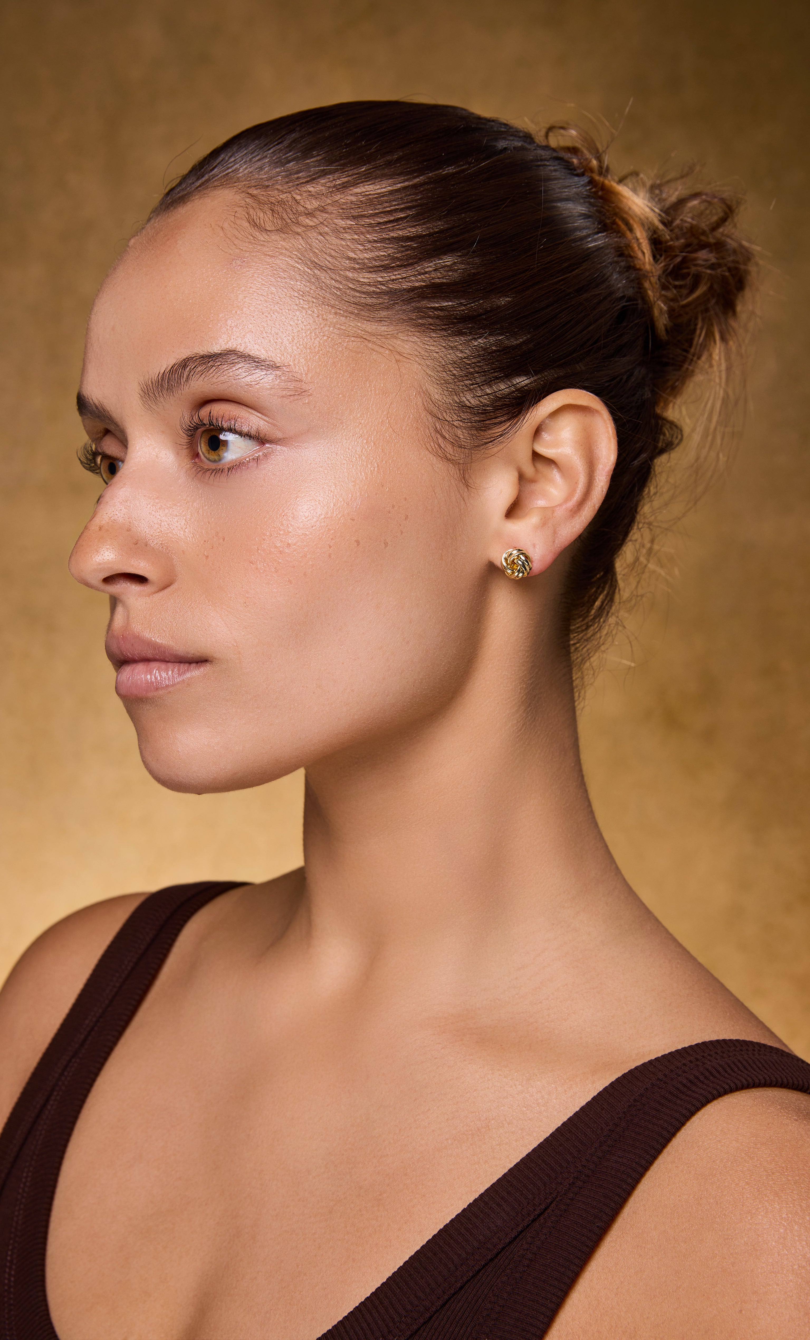 14K gold fill dainty knot stud earrings by Tunik, elegant jewellery gifts complementing gold necklace styles.