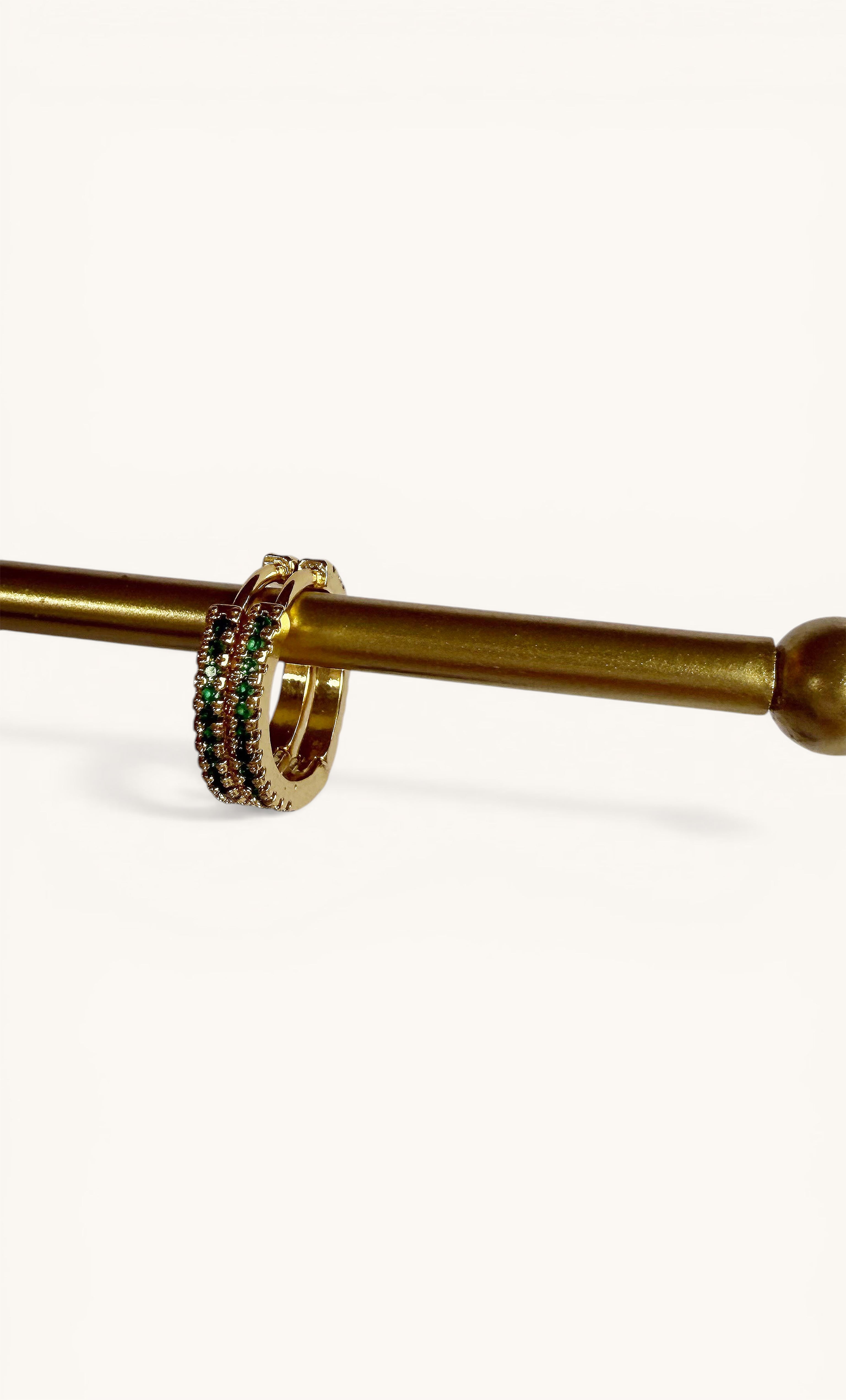 Gold fill Gaia huggie earrings from Tunik with green and blue zirconia stones, jewellery gifts.
