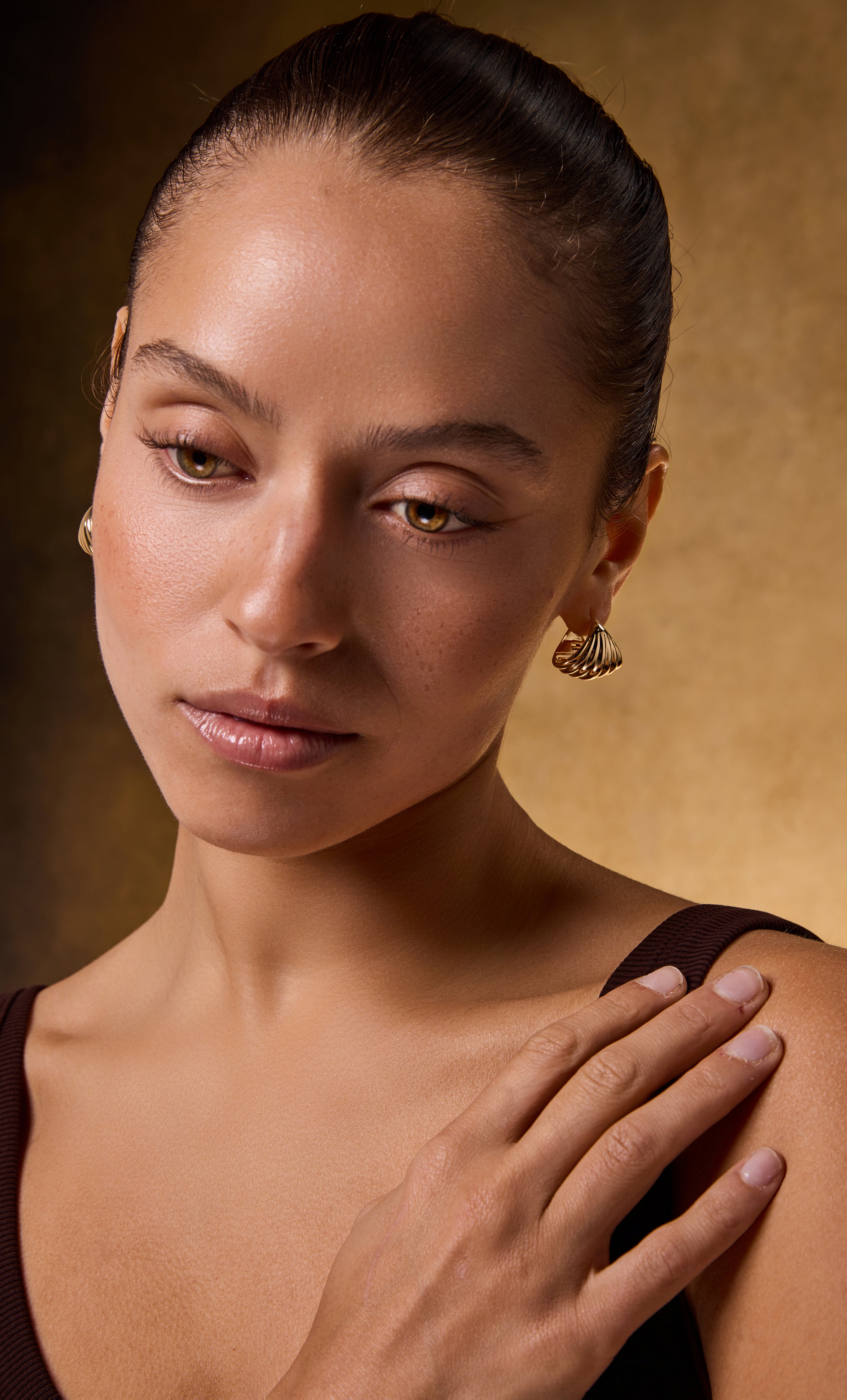 Tunik gold fill Sculpt 18K shell huggie earrings with model wearing gold necklace and jewellery gifts style.