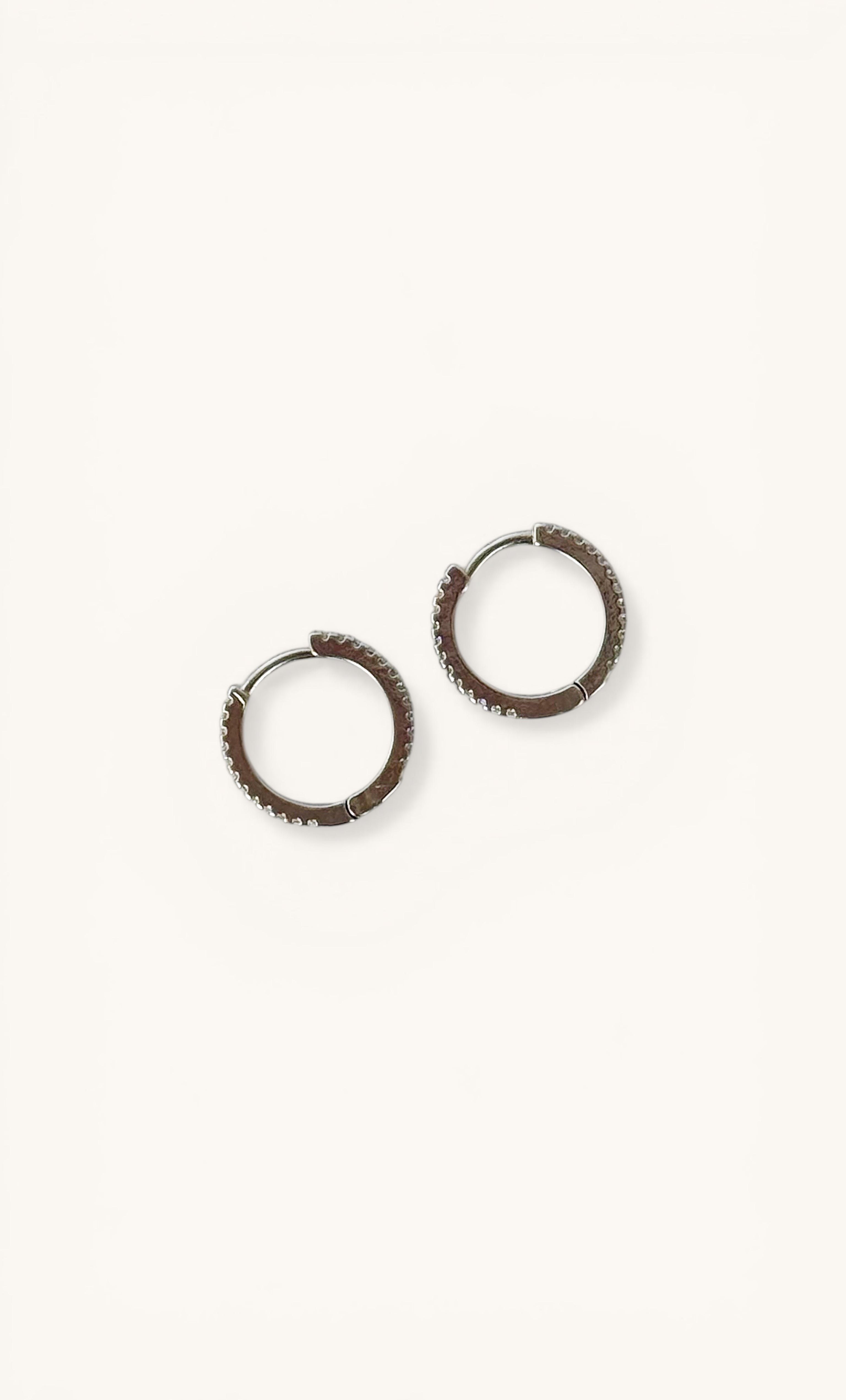 Gaia silver huggie earrings with zirconia stones by Tunik, elegant jewellery gifts.